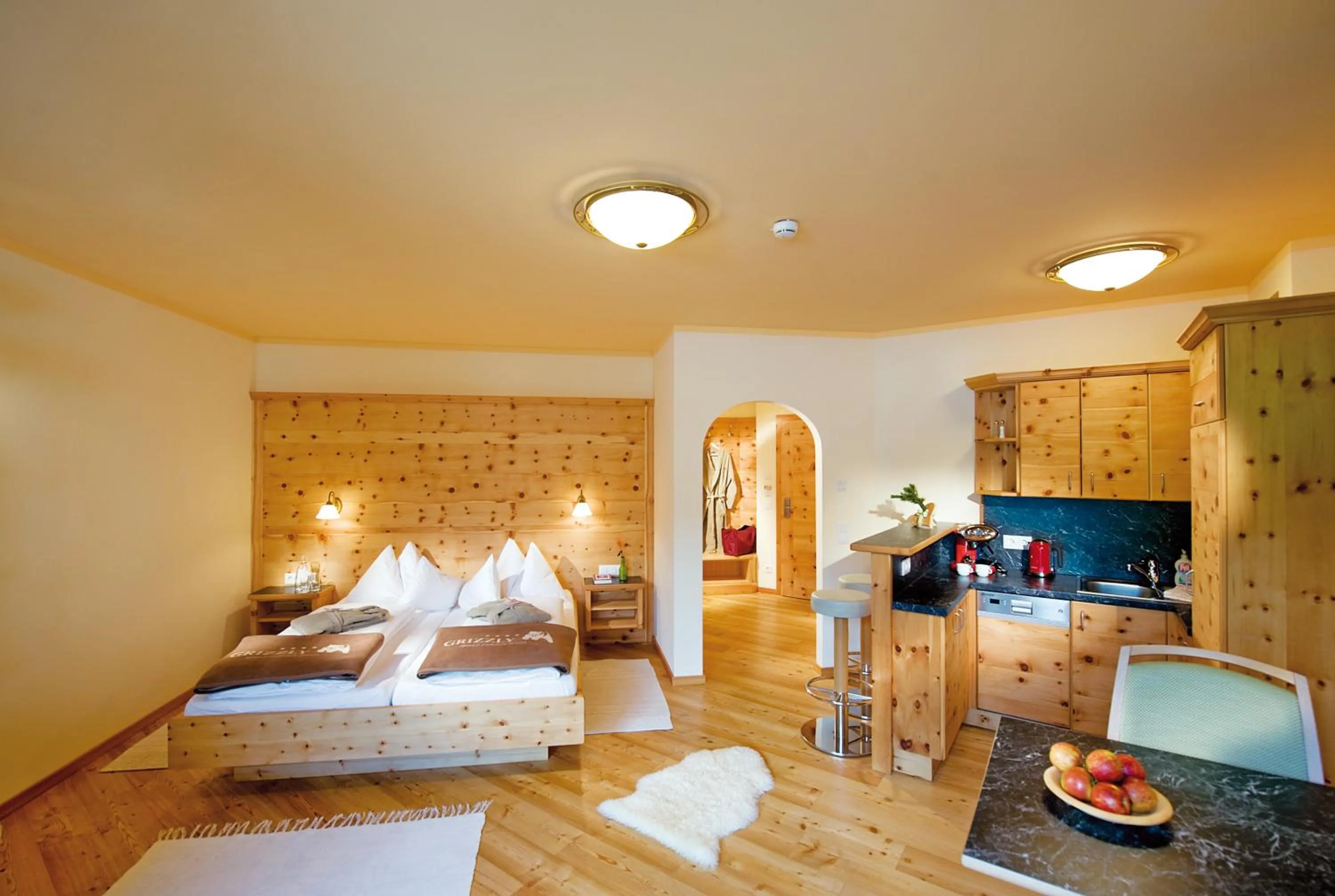 Photo of the whole room, Bed in Grizzly Sport & Motorrad Resort