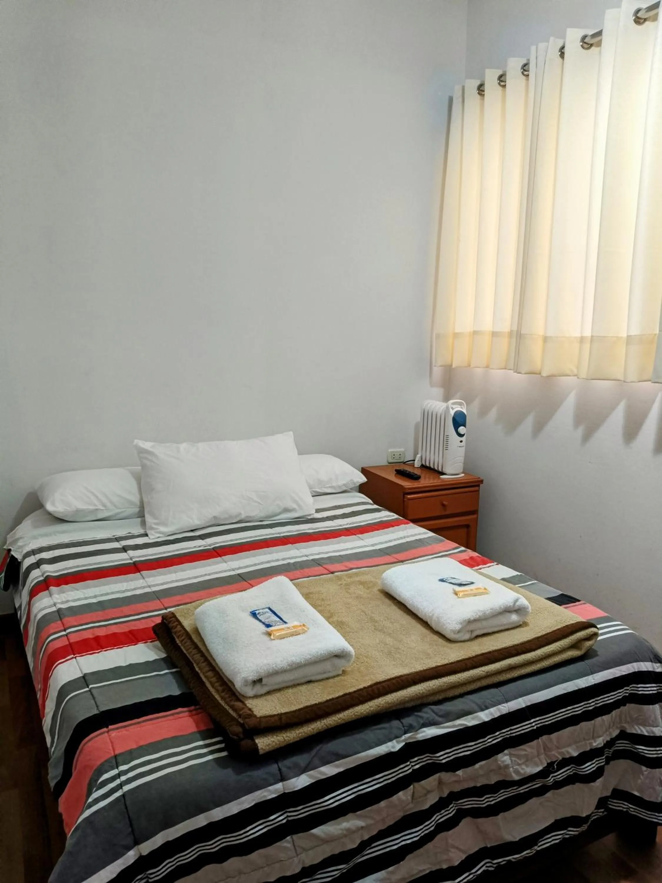 Photo of the whole room, Bed in Samanai Wasi