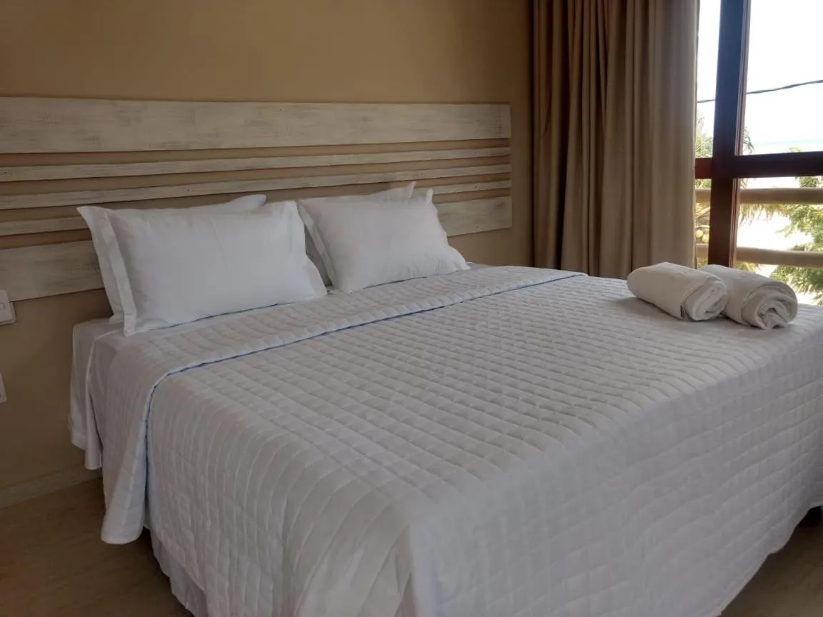 Bed in RANCHO GOSTOSO POUSADA