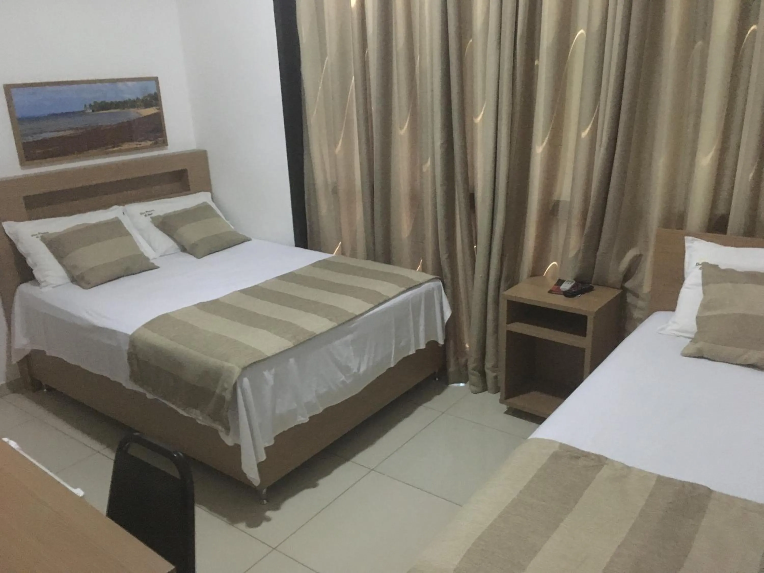 Bed in Hotel Dom Passos