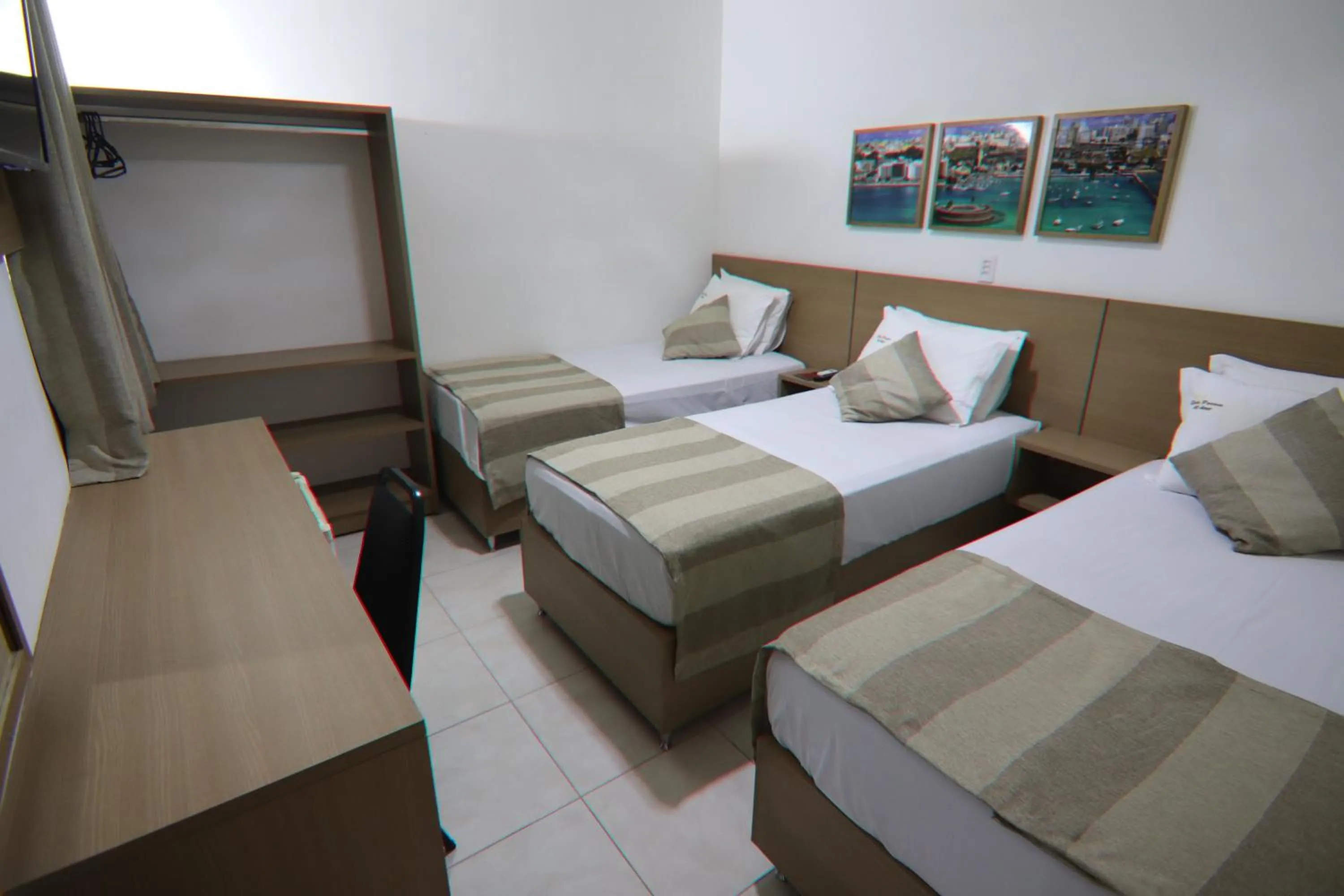 Bed in Hotel Dom Passos