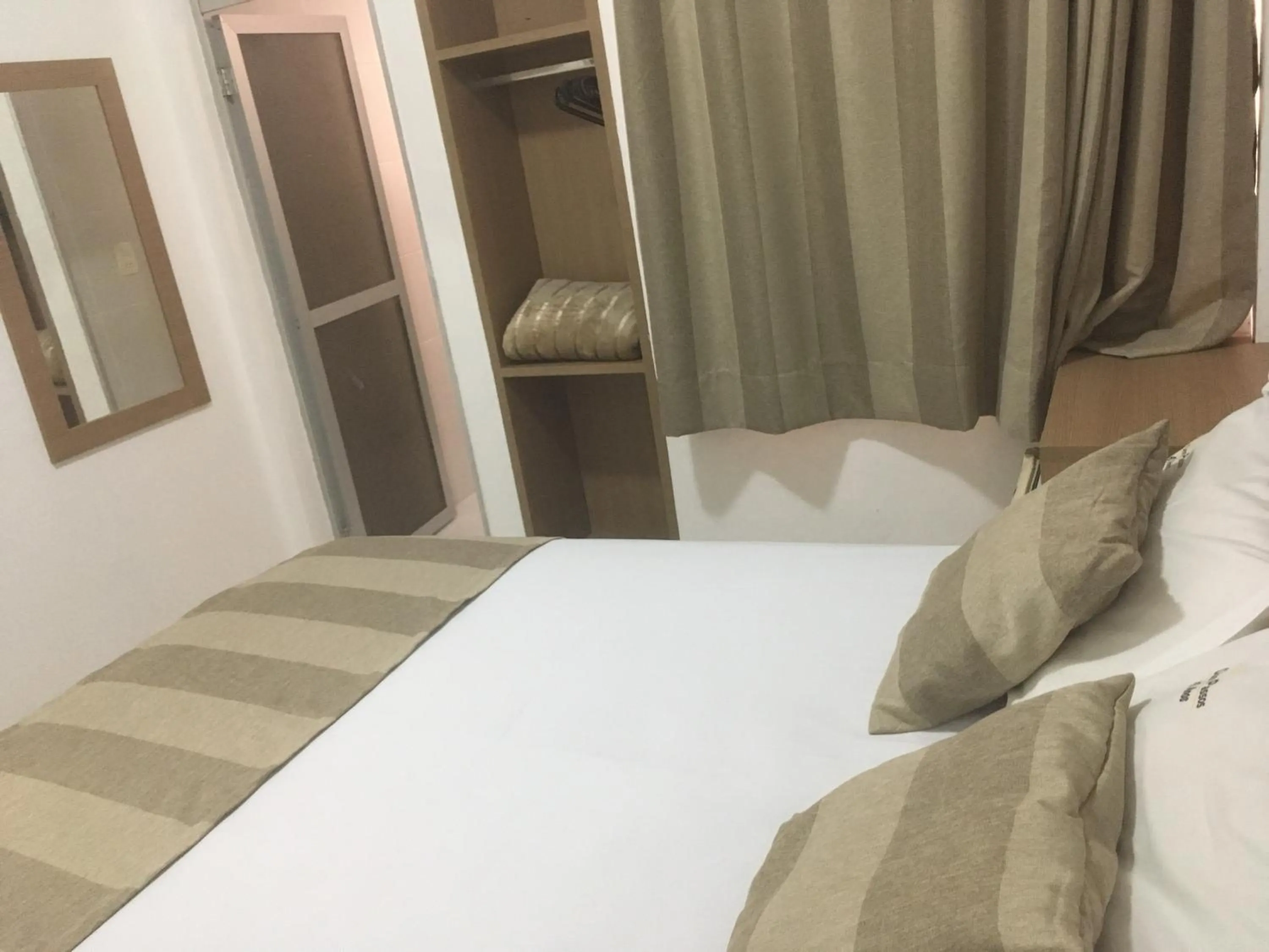 Bed in Hotel Dom Passos