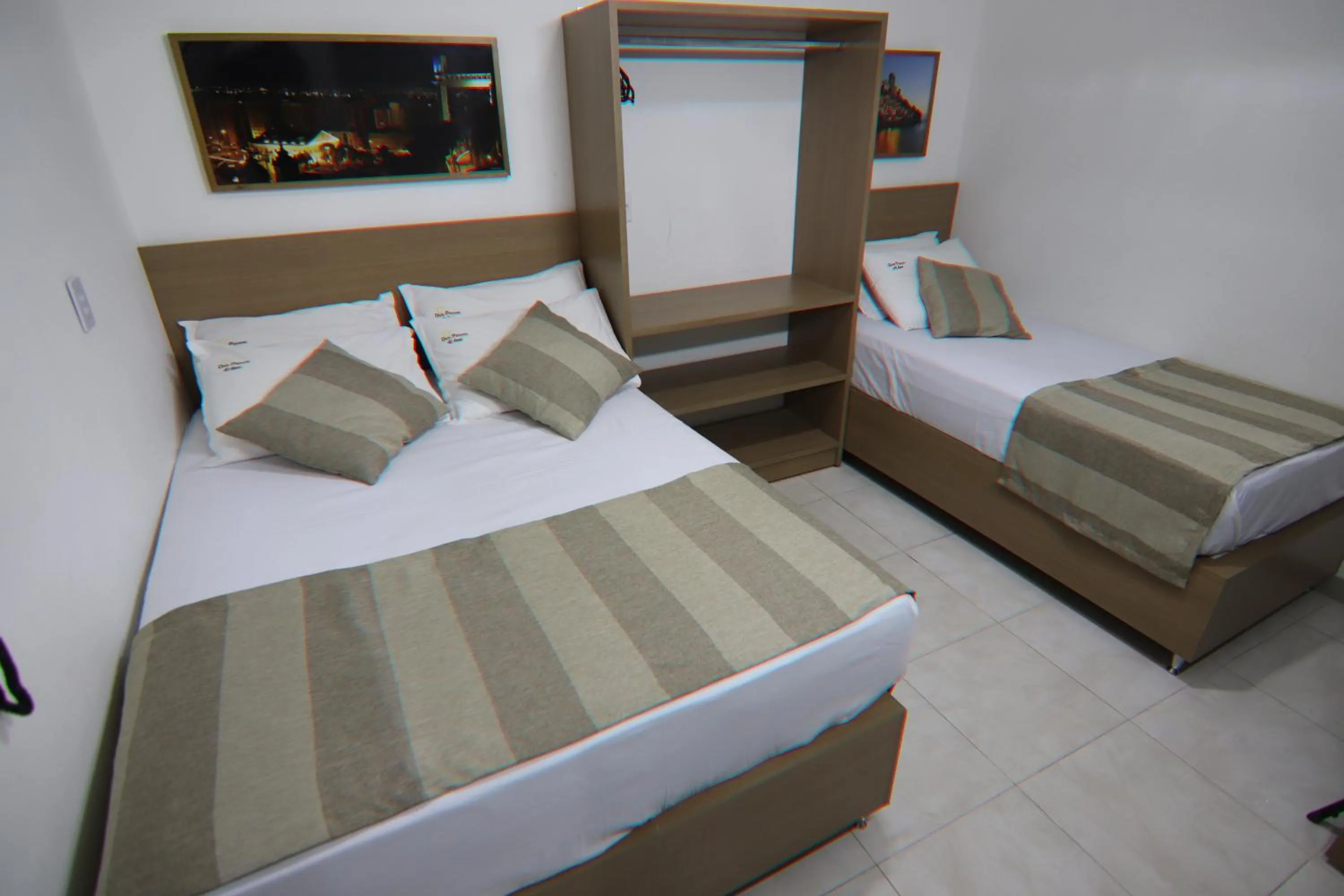 Bed in Hotel Dom Passos