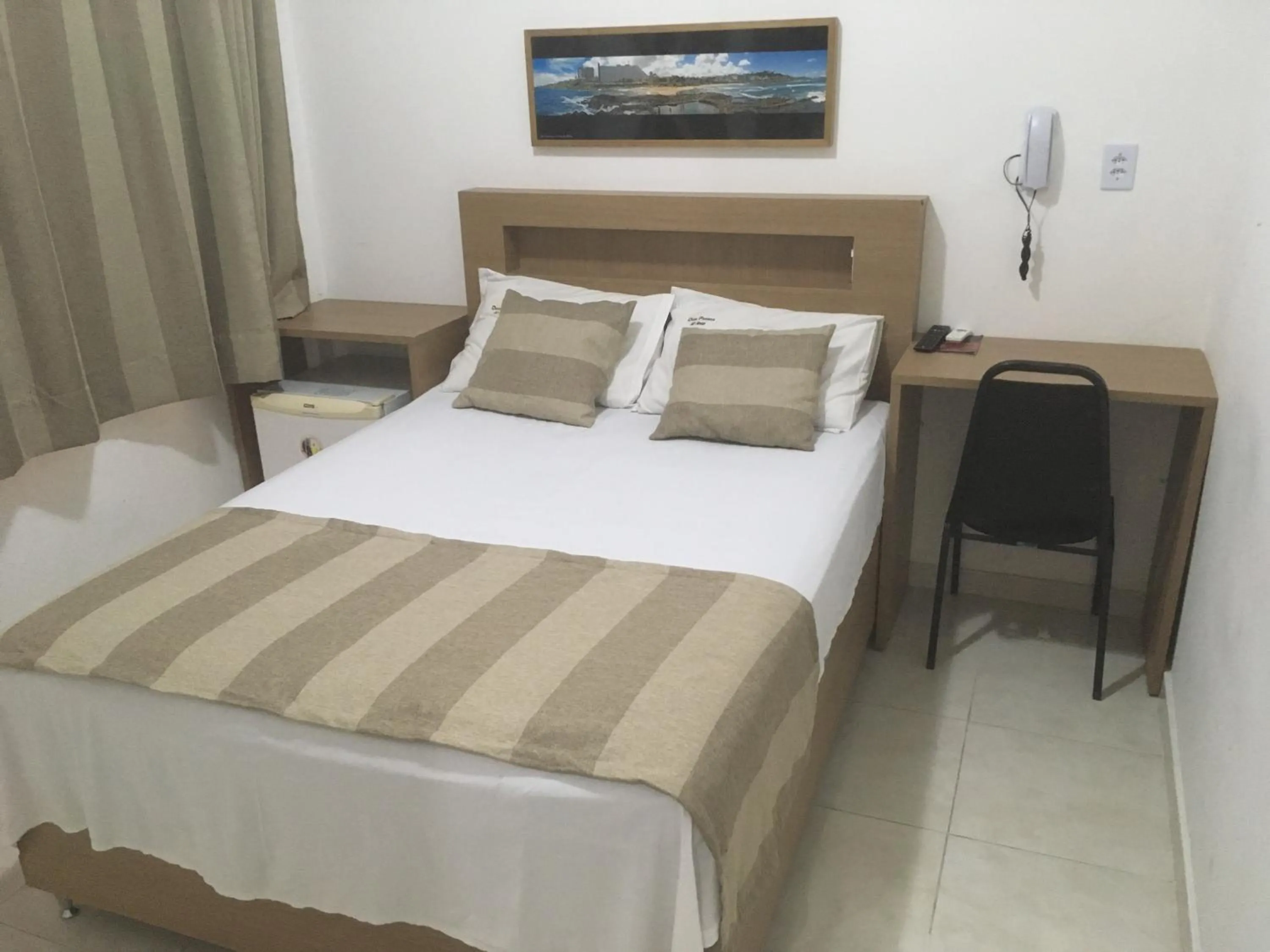 Bed in Hotel Dom Passos