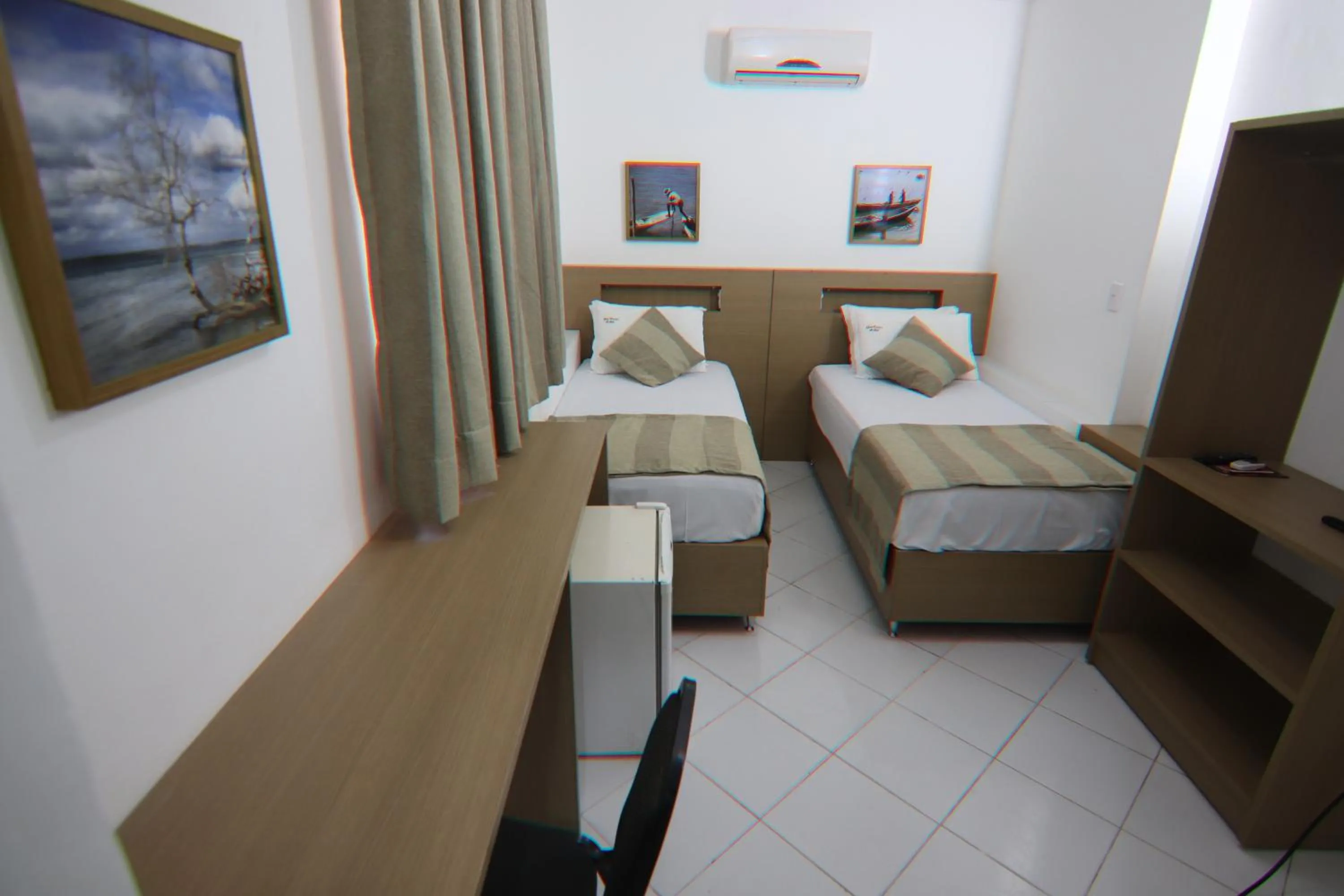 Bed in Hotel Dom Passos