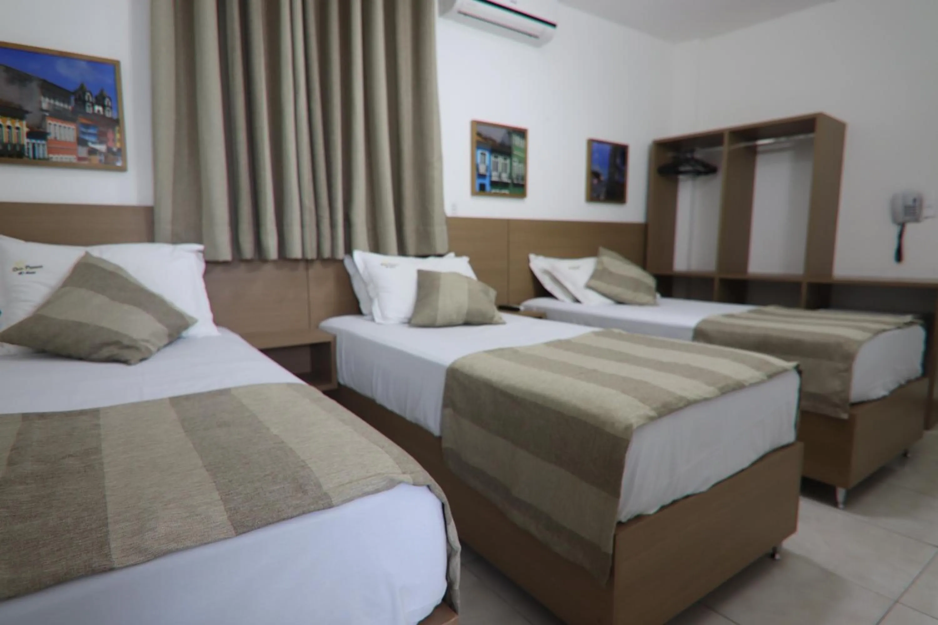 Bed in Hotel Dom Passos