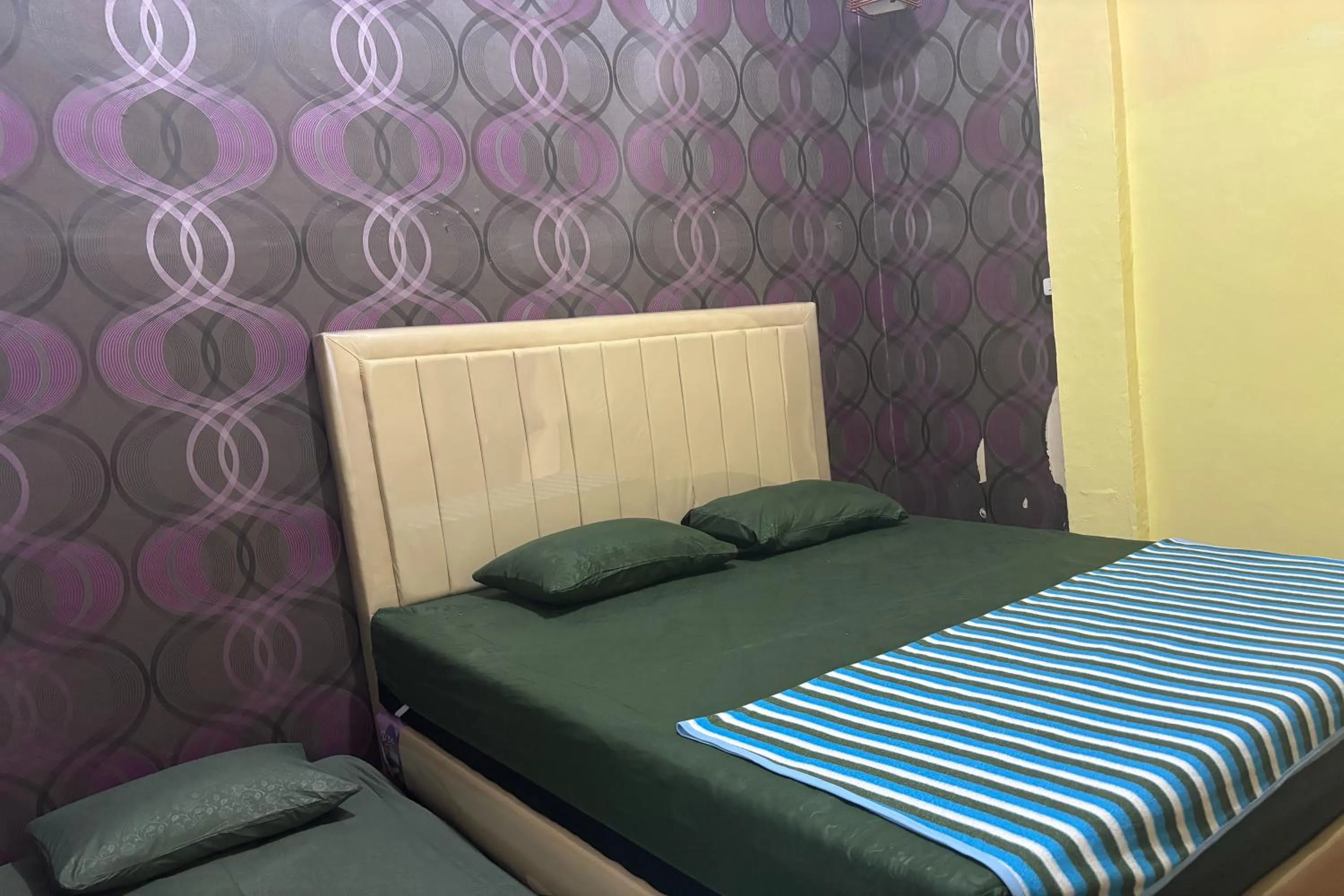 Bed in Waroeng Transit & Depary Homestay