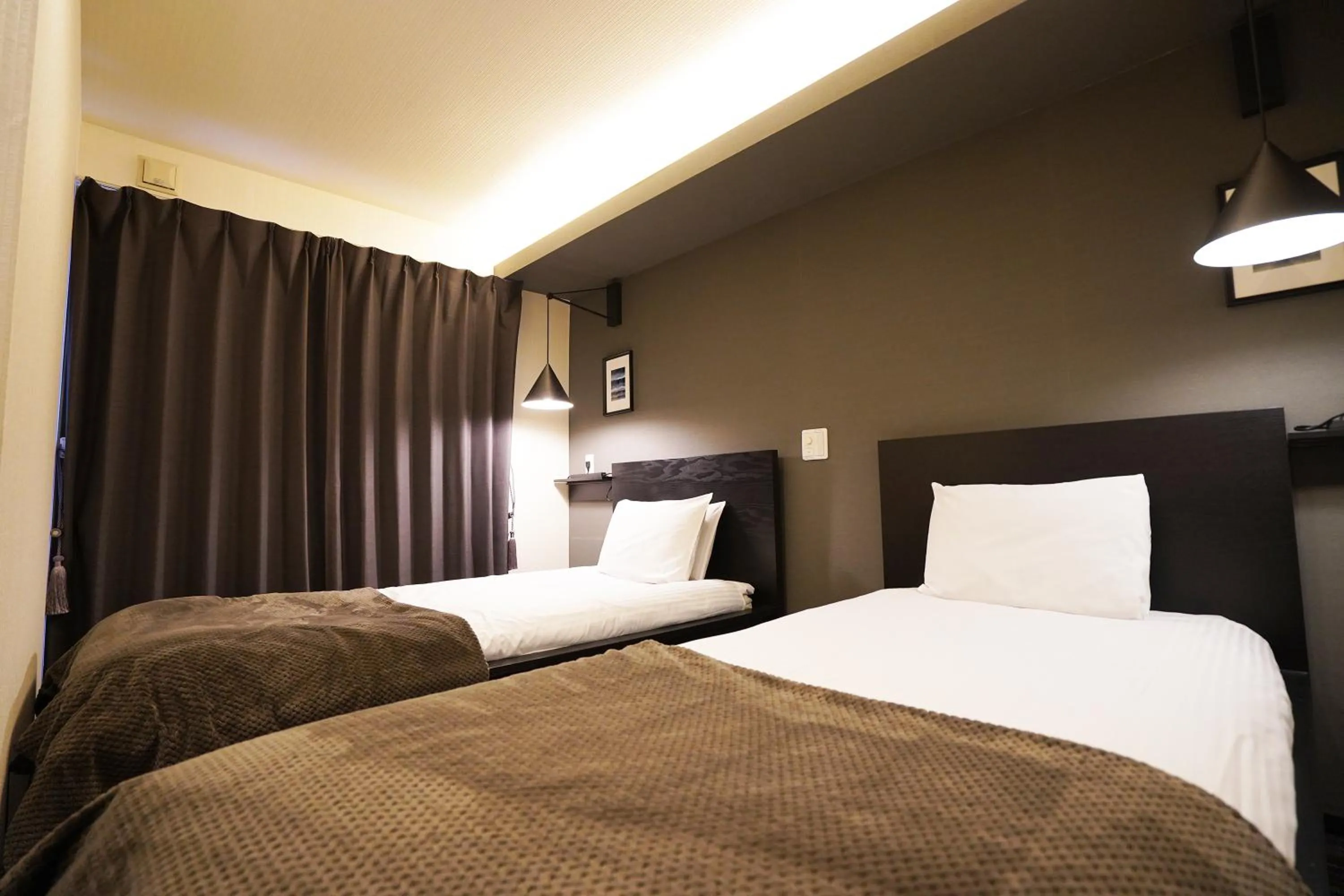 Bed in One's Villa Sapporo