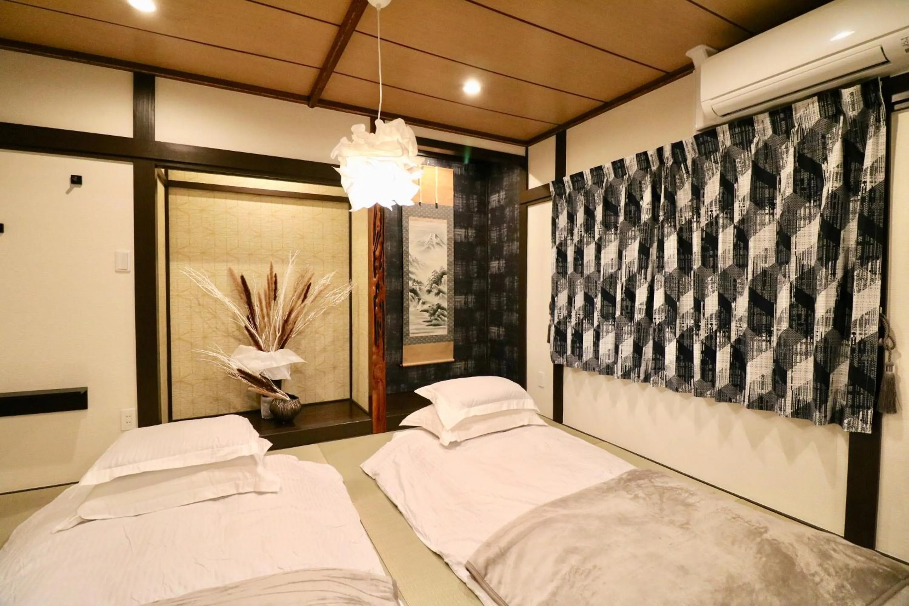 Bed in One's Villa Sapporo