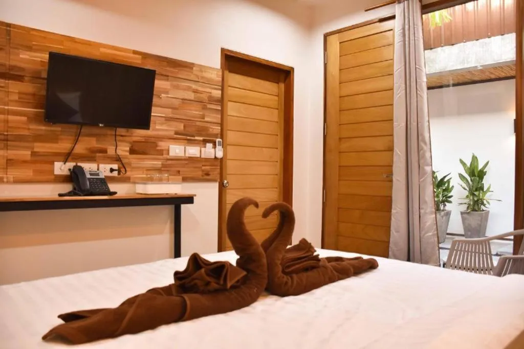 Bed in Momento Bangtao Beach