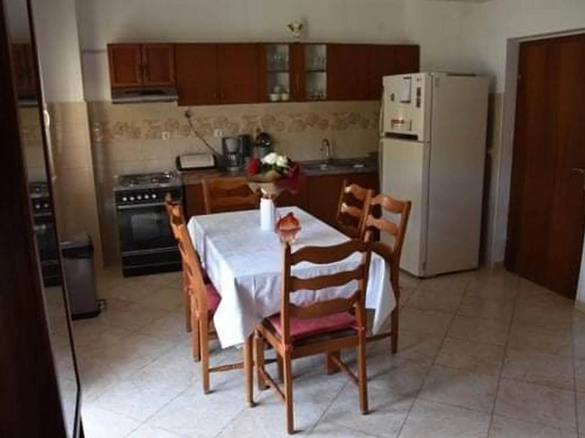 Kitchen or kitchenette in Apartment Manigo