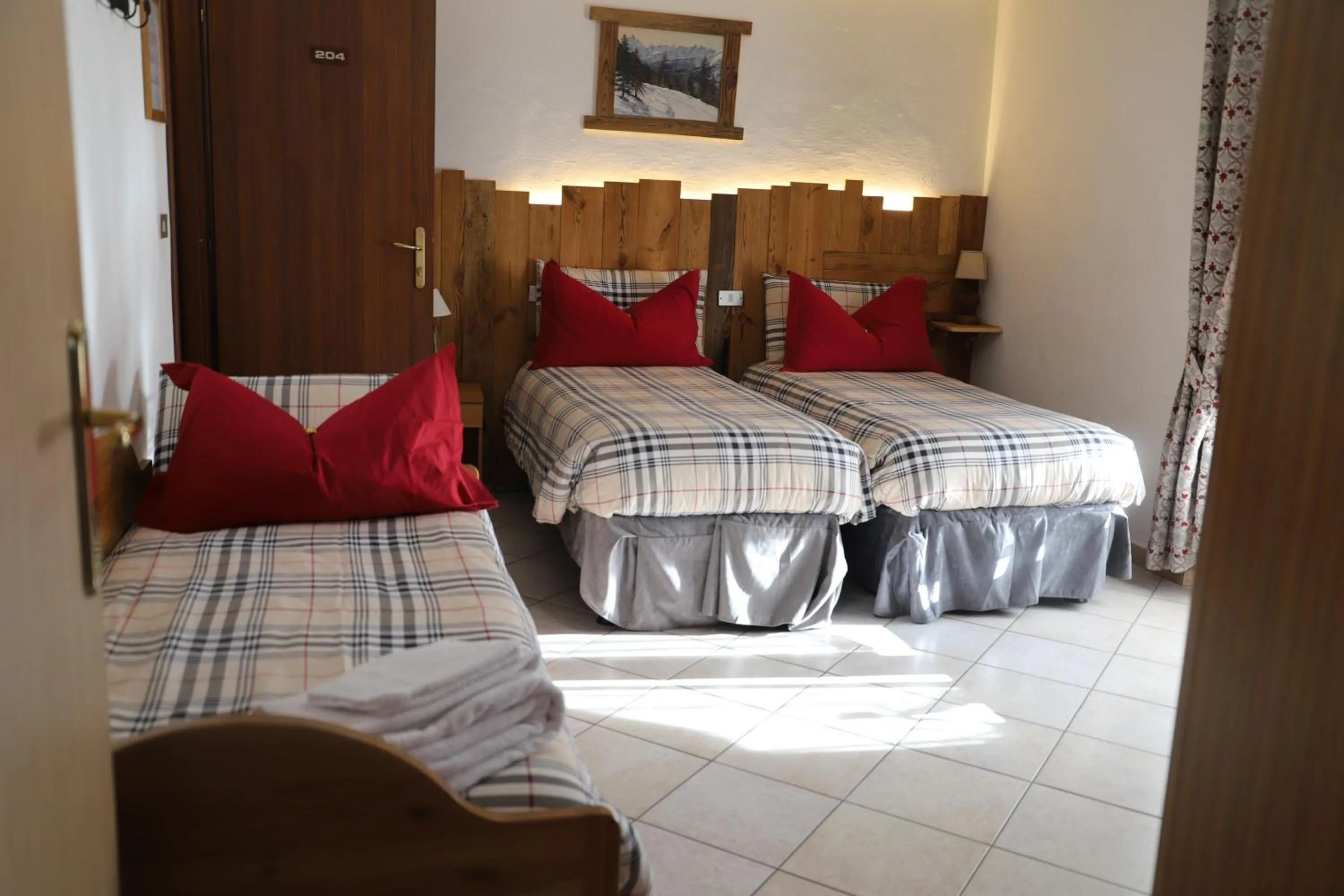 Bed in Hotel Bucaneve