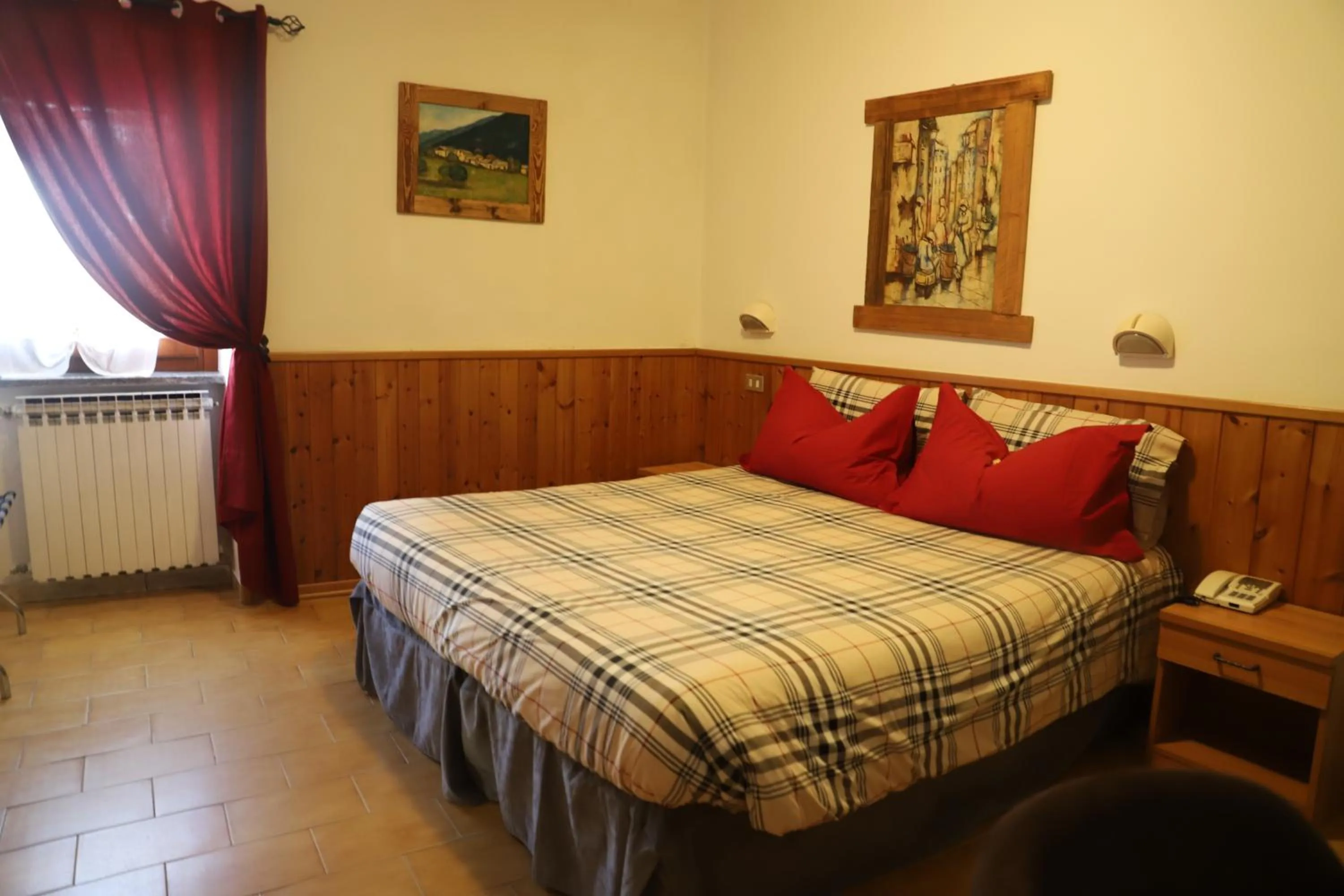 Bed in Hotel Bucaneve