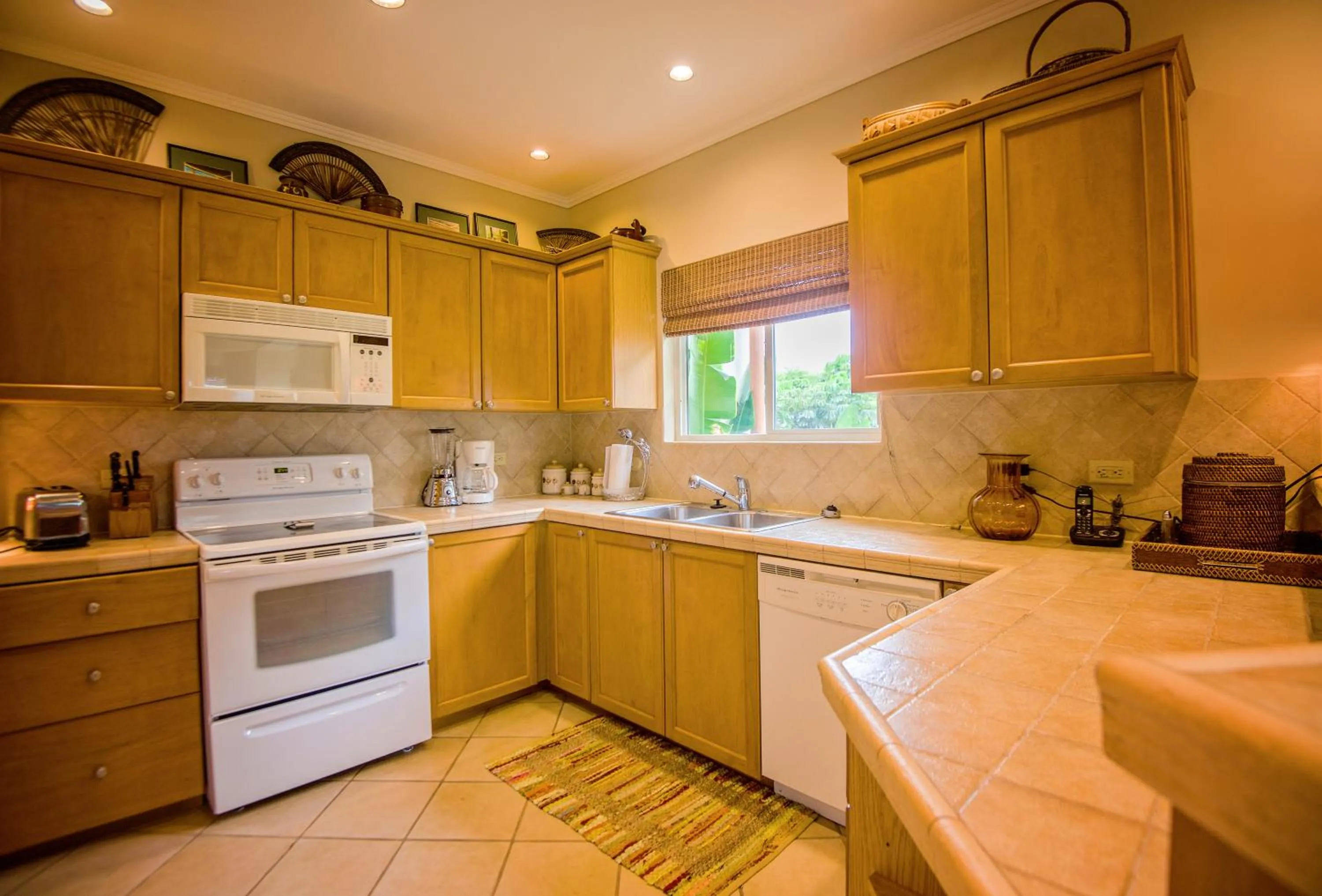 Kitchen or kitchenette in HRG Condos at Los Sueños
