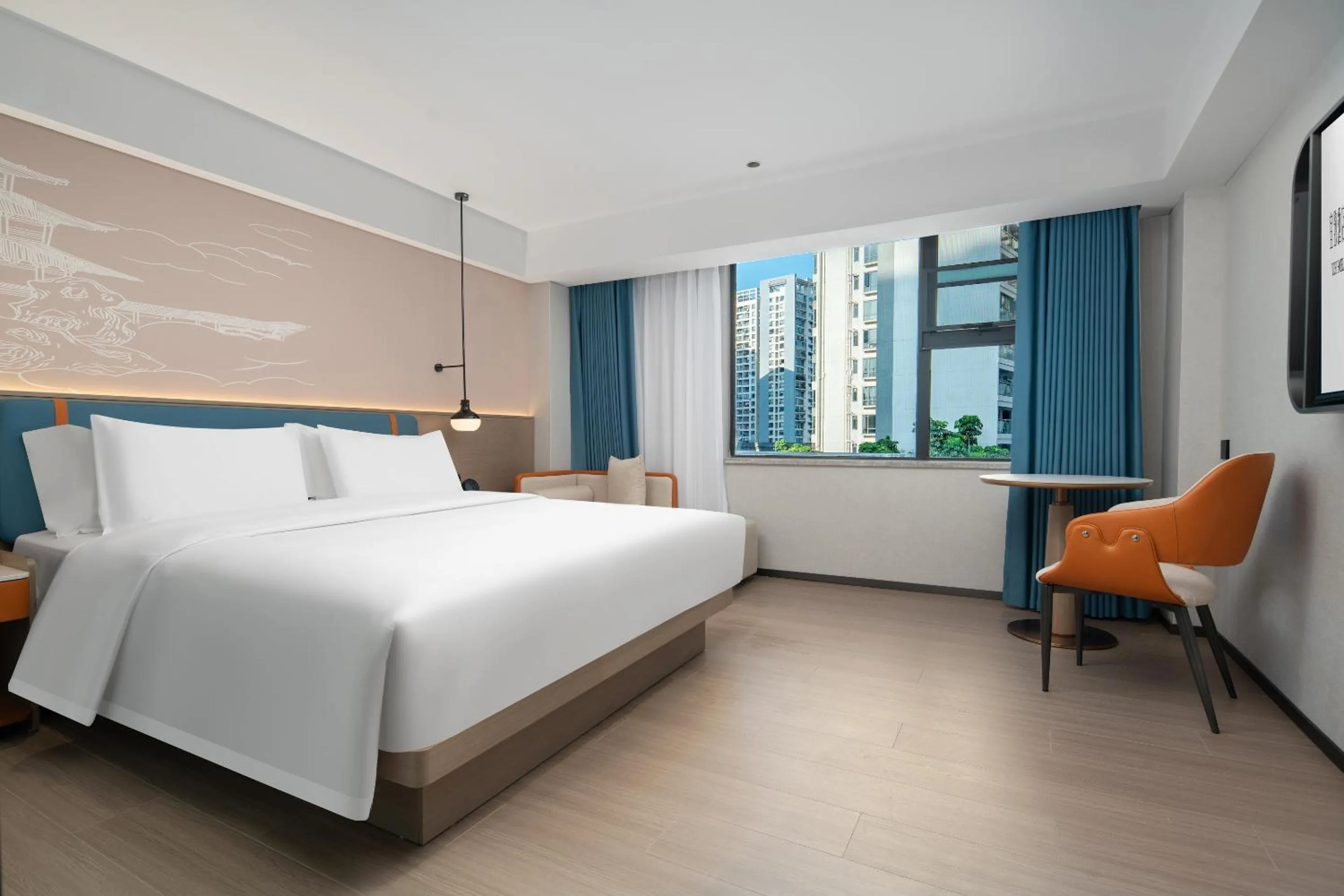 Living room, Bed in Yizhi Hotel Changgang Metro Station - Free Shuttle Bus during Canton Fair