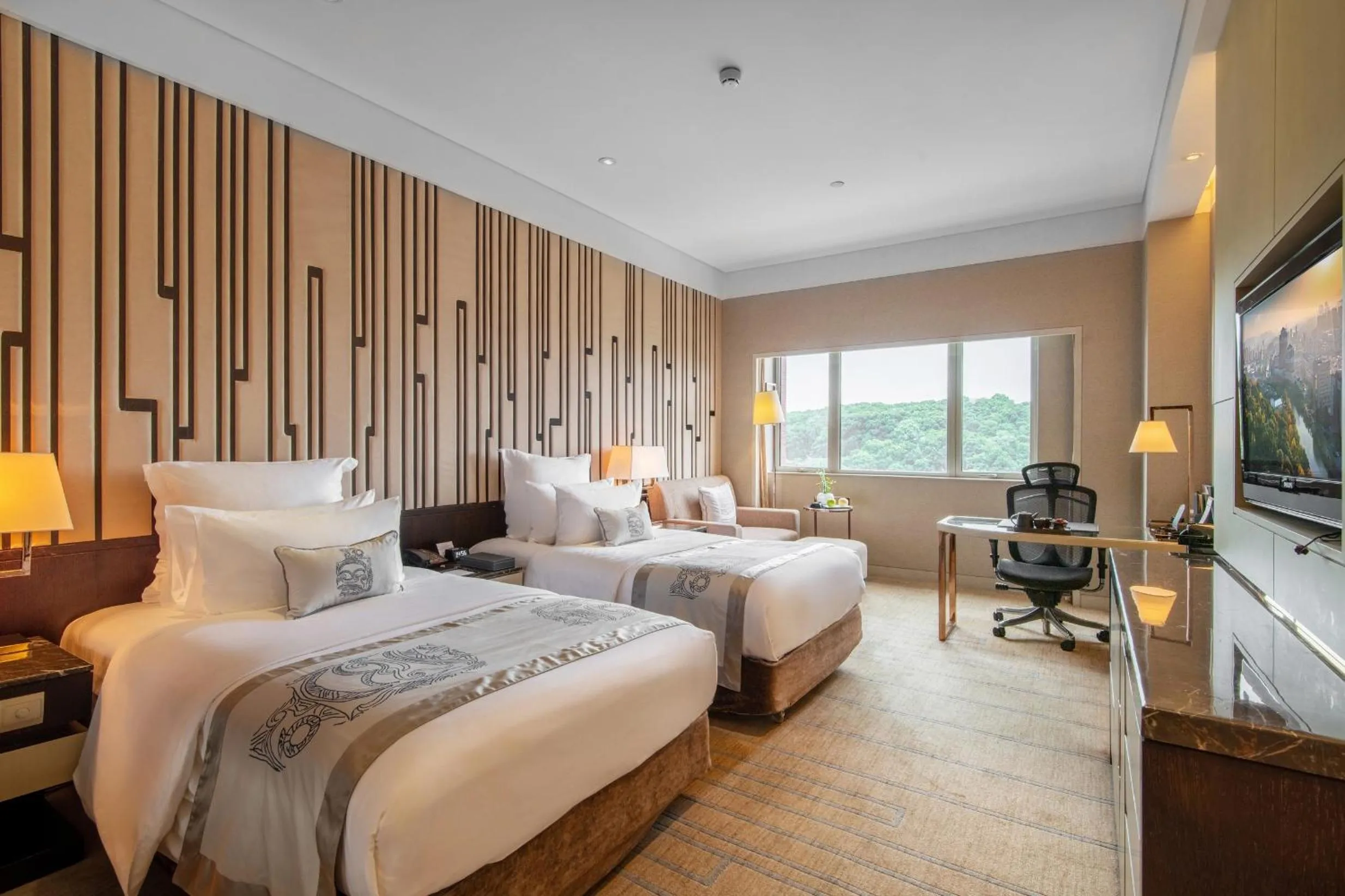 Bed in Grand Pacific Hotel Ningbo