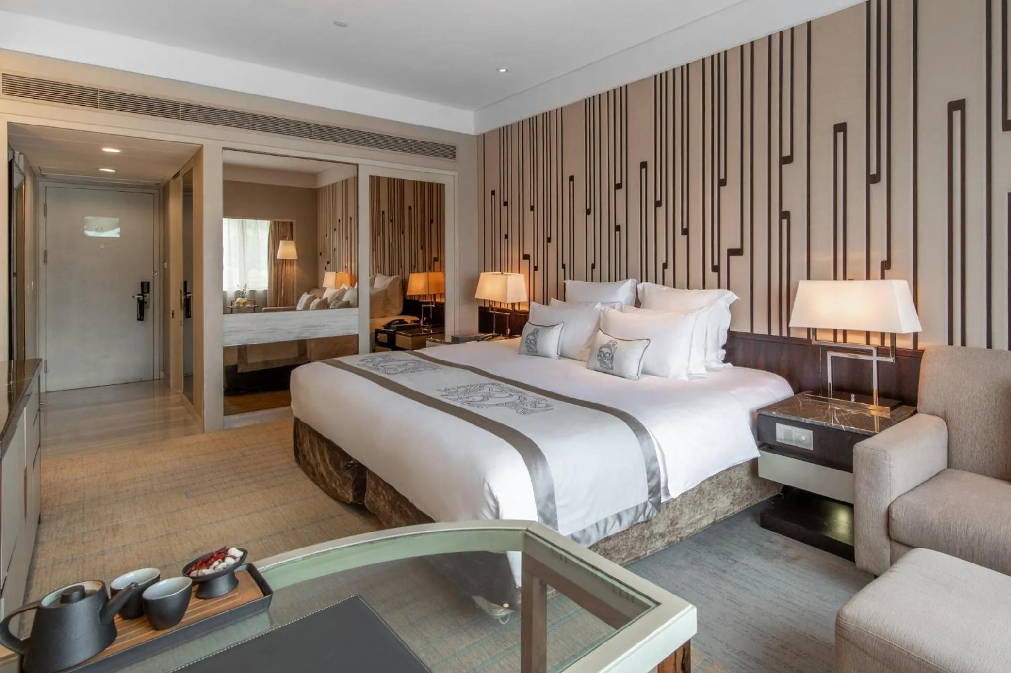 Bed in Grand Pacific Hotel Ningbo