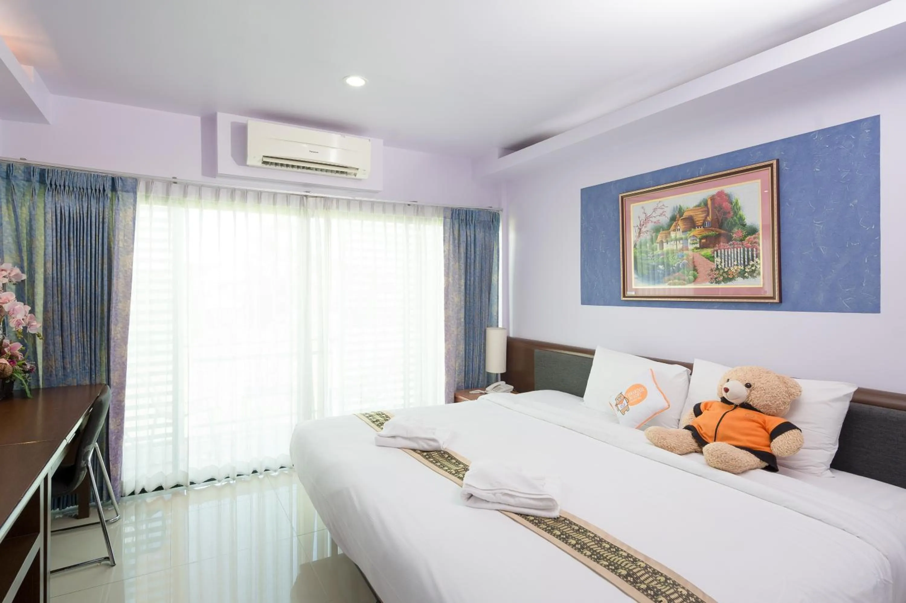 Photo of the whole room, Bed in Chayadol Resort - SHA Extra Plus