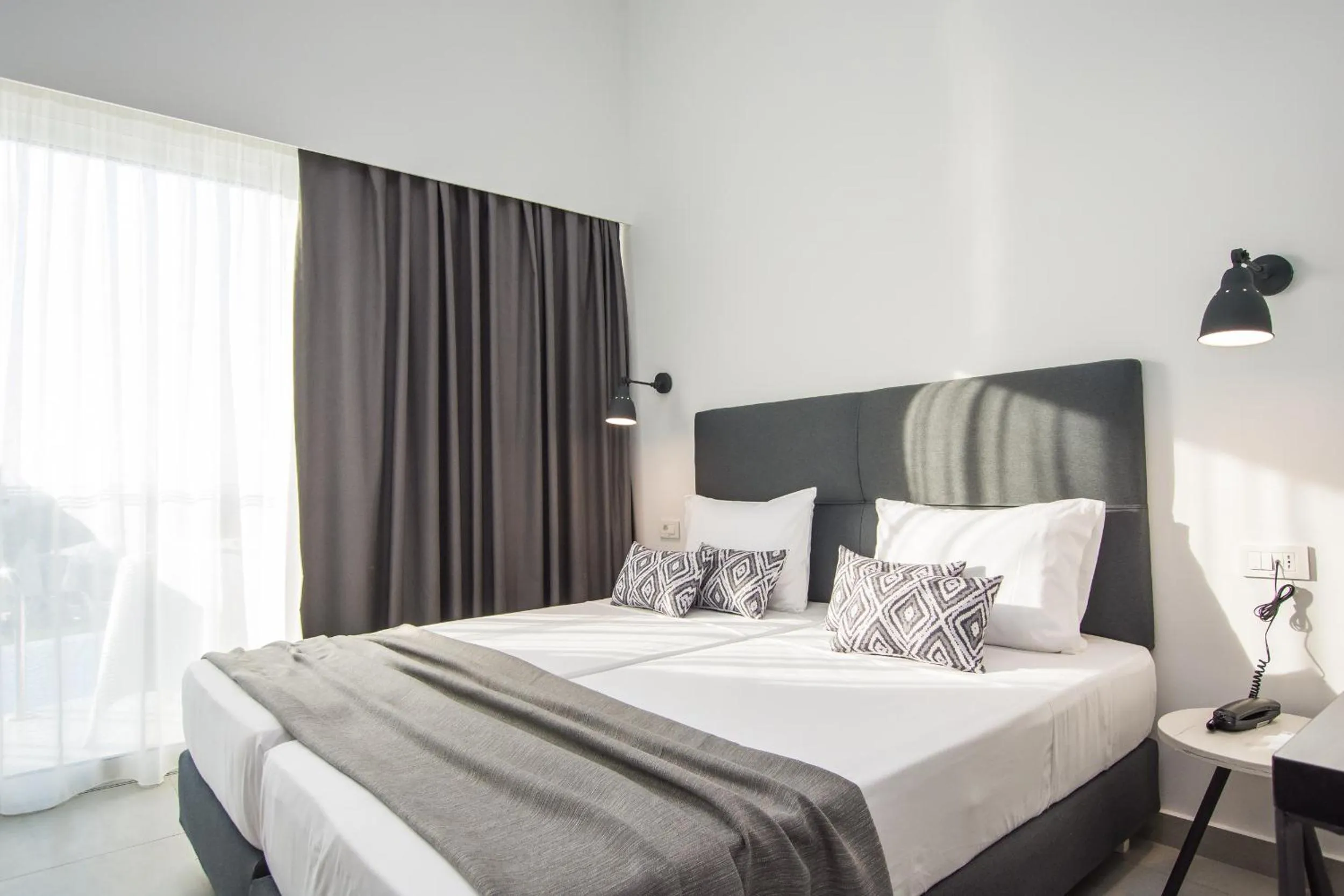 Bed in Golden Coast Beachfront Resort