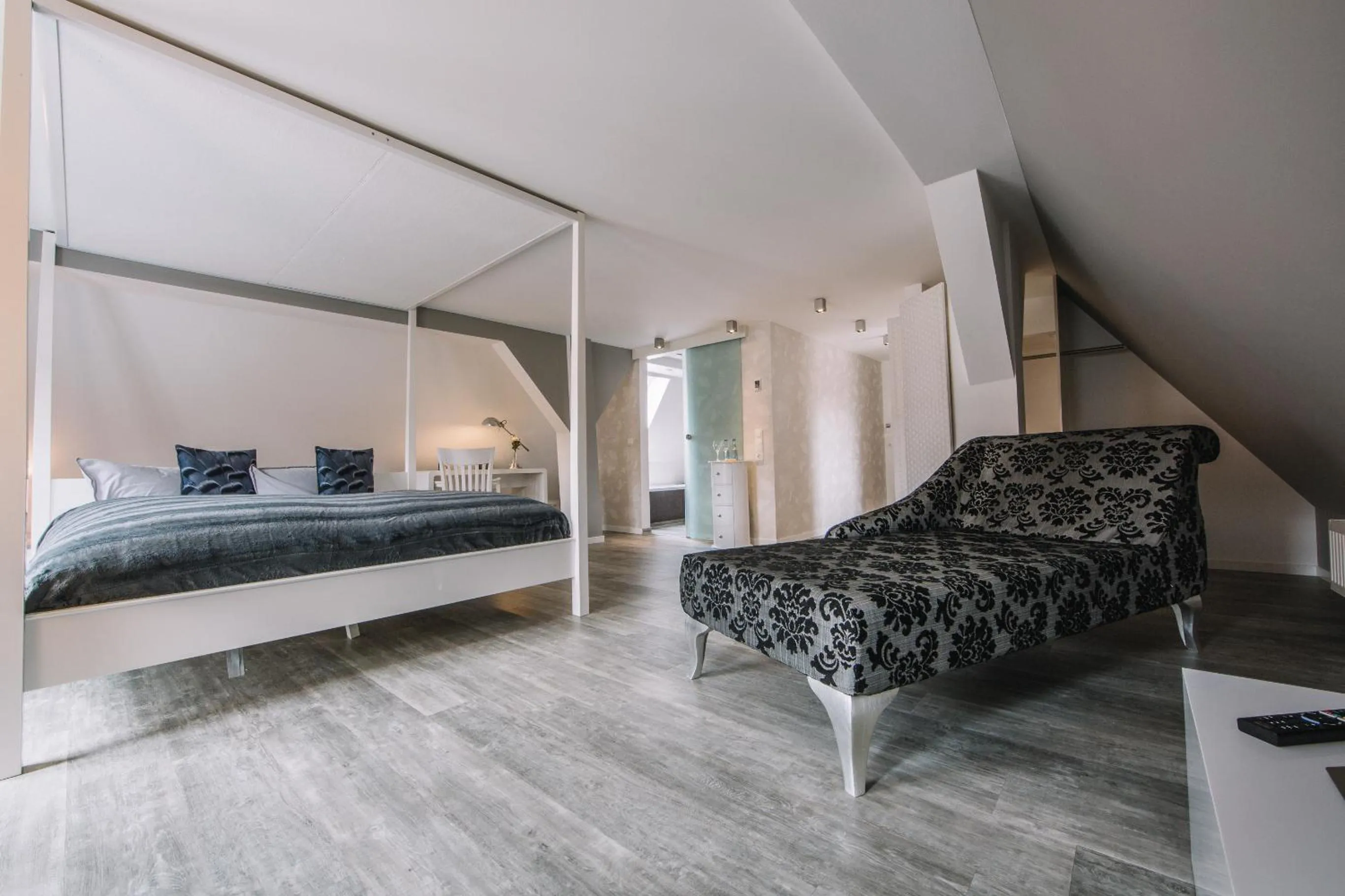 Photo of the whole room, Bed in Boutique Hotel Pfauen