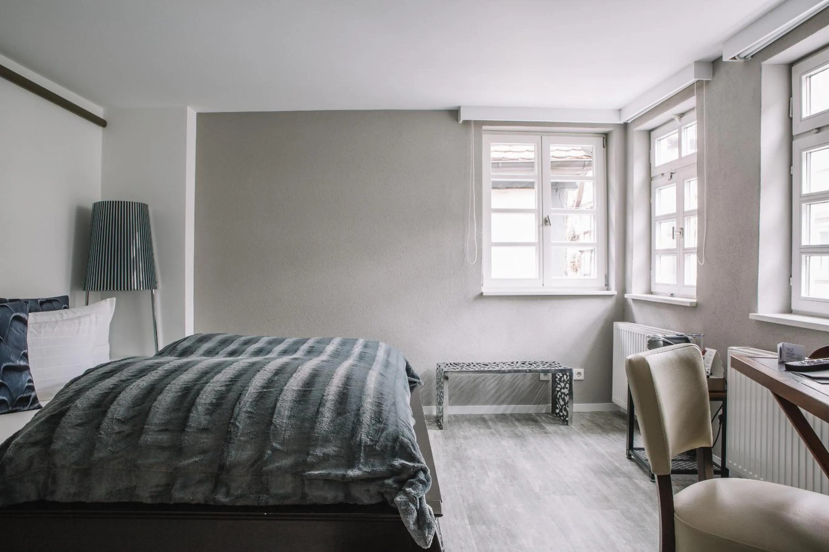 Photo of the whole room, Bed in Boutique Hotel Pfauen