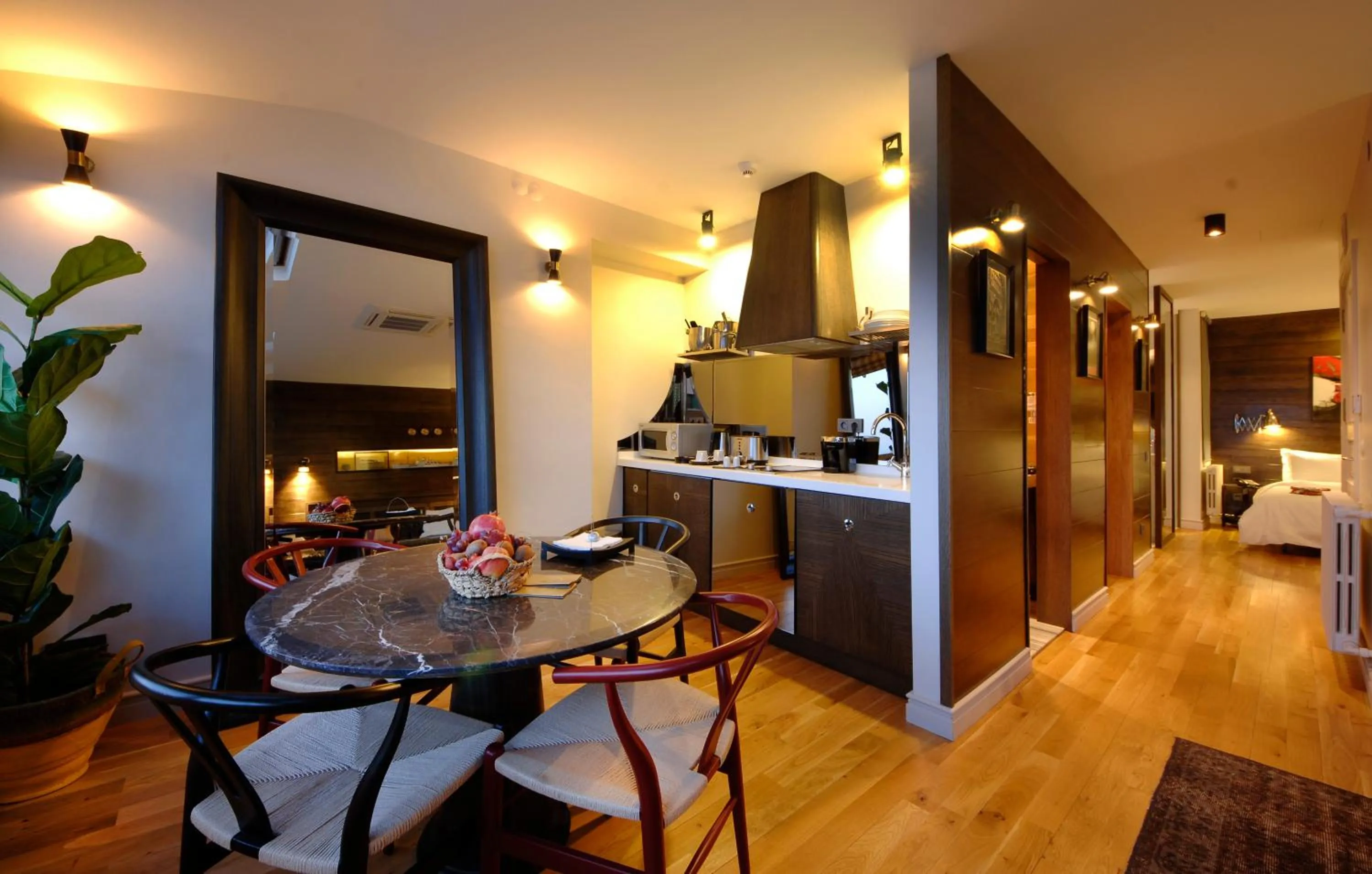 Kitchen or kitchenette, Bed in Urban Suites