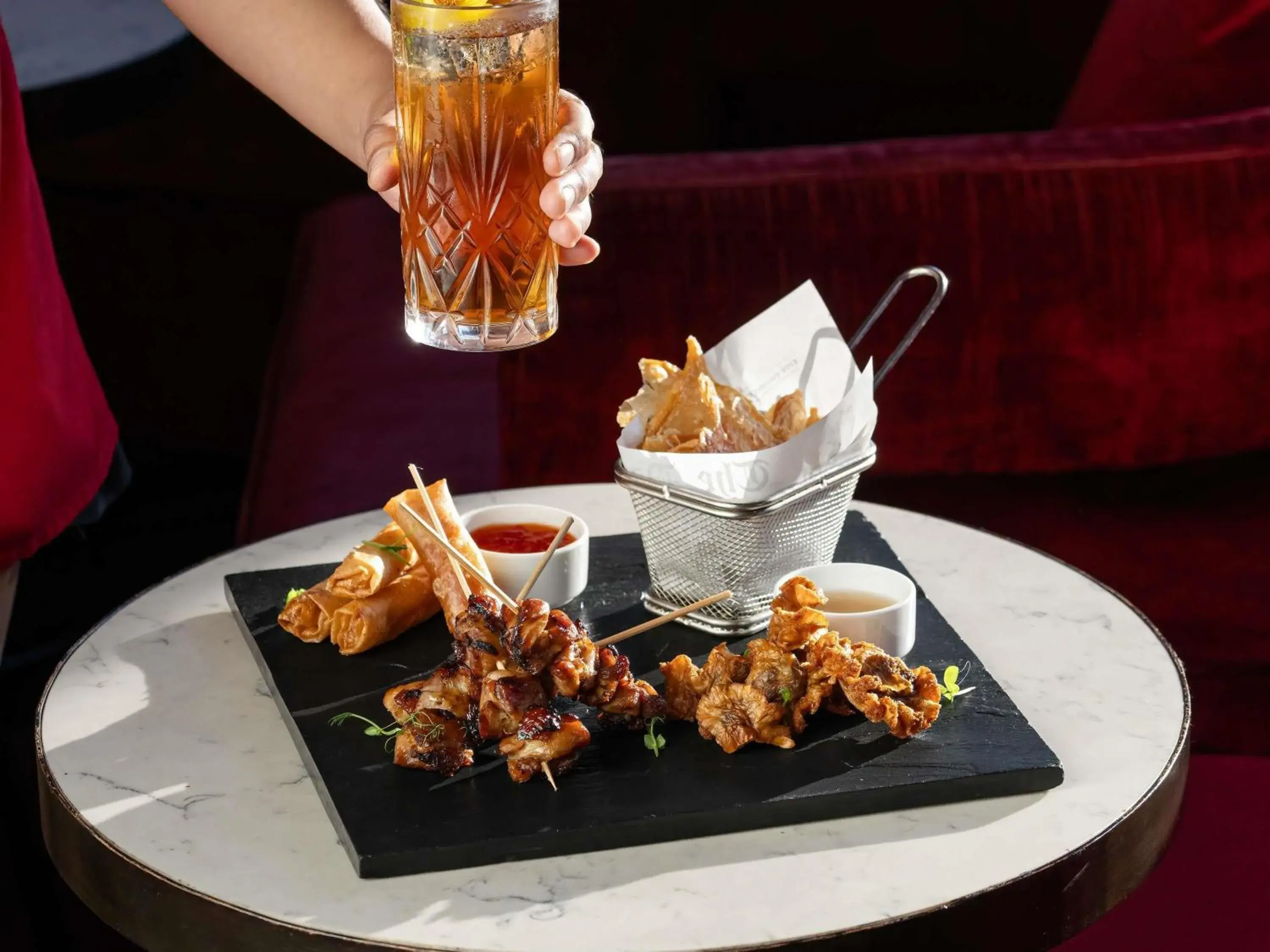 Lounge or bar in Raffles Makati Lounge or bar in Raffles Makati