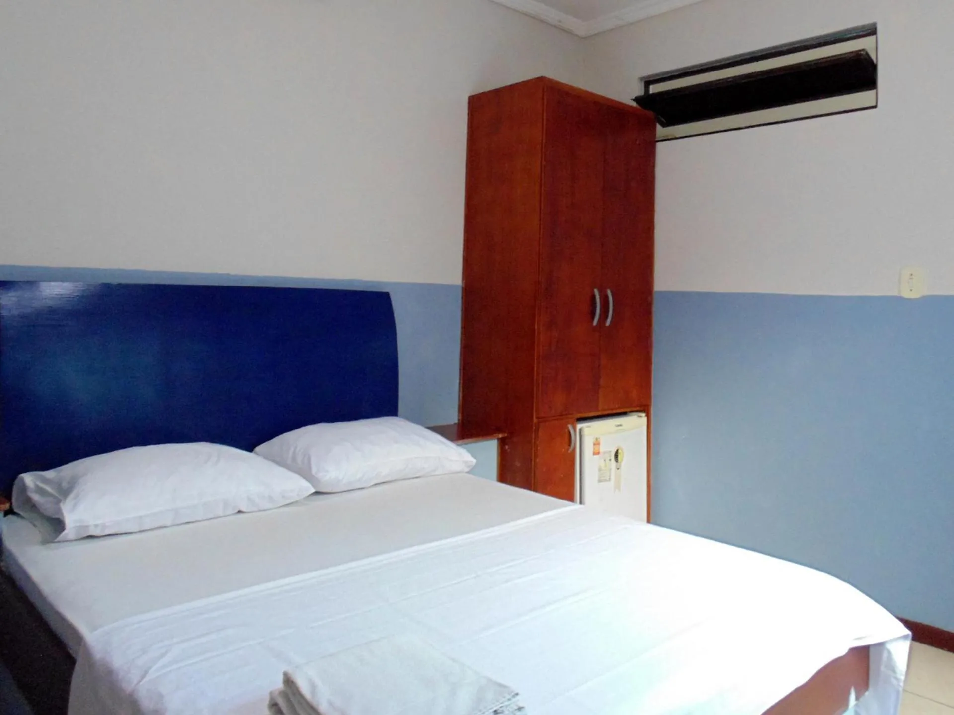 Bed in FAROL BEACH Suítes