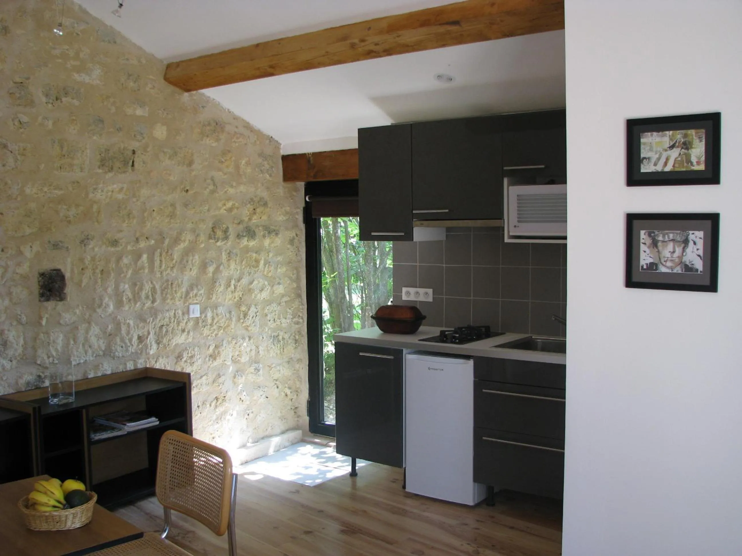 Kitchen or kitchenette in gîte le cayrols