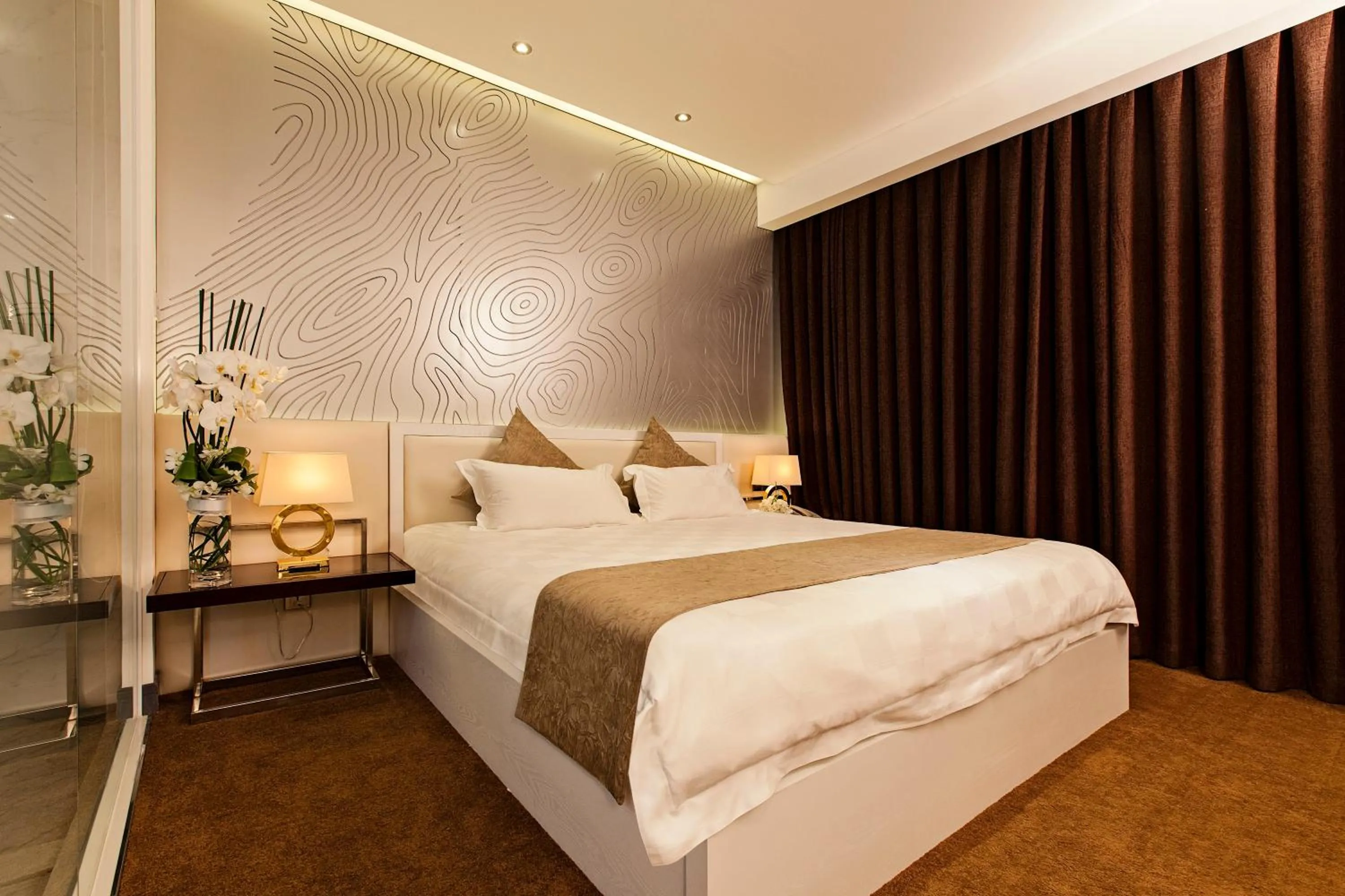 Bed in Signature Boutique Hotel