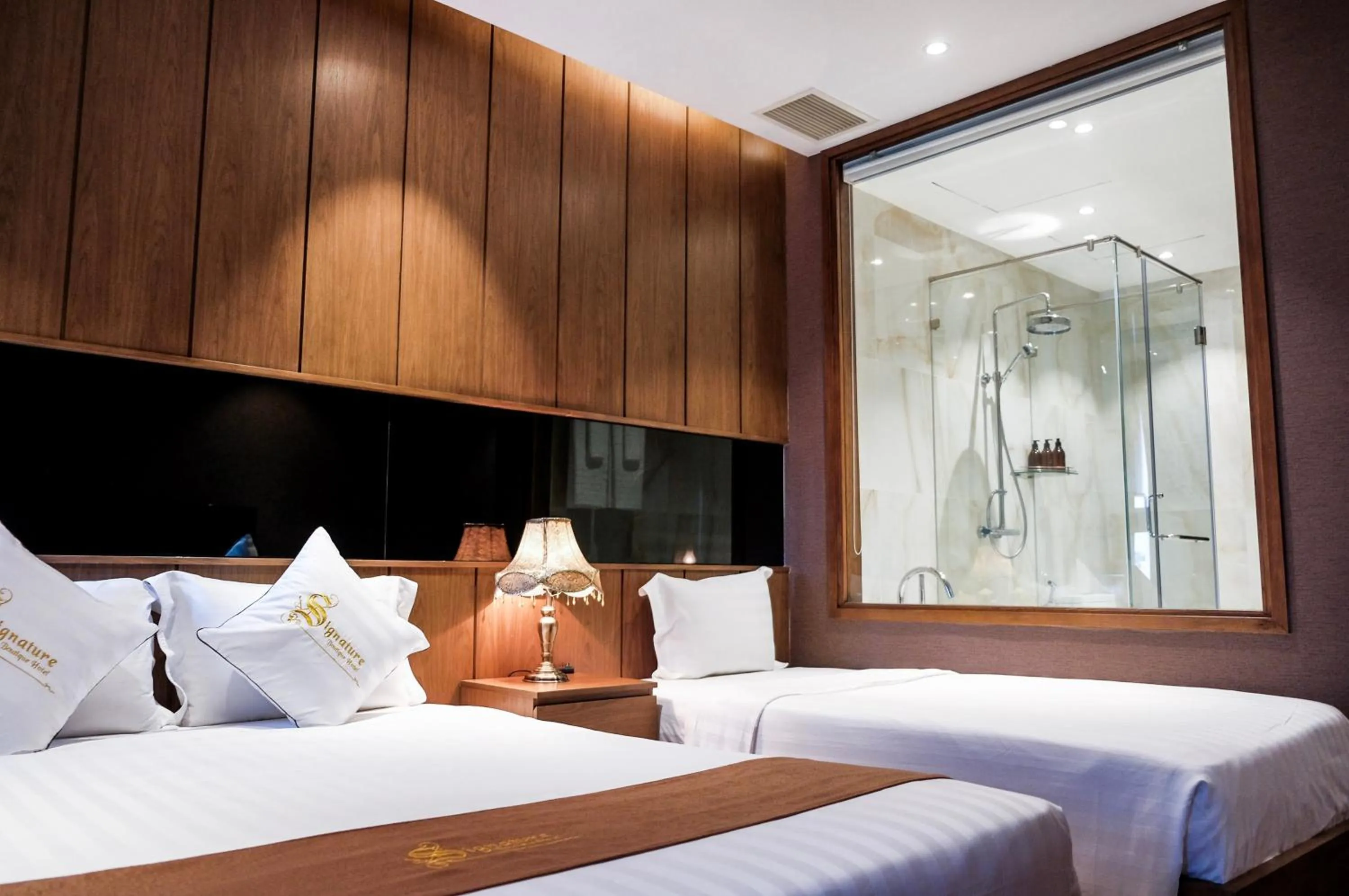 Bed in Signature Boutique Hotel