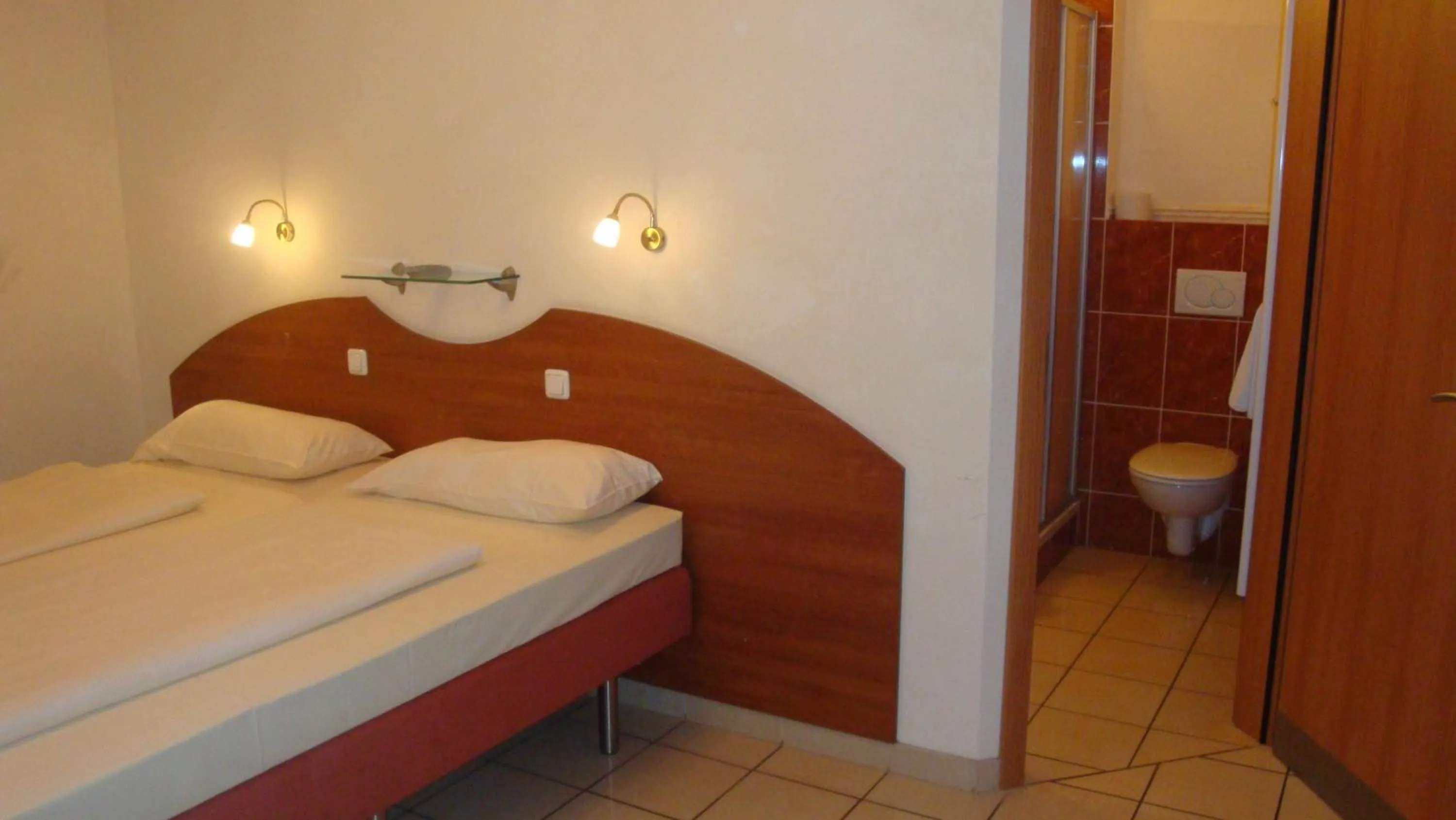 Photo of the whole room, Bed in StadtHotel Passau