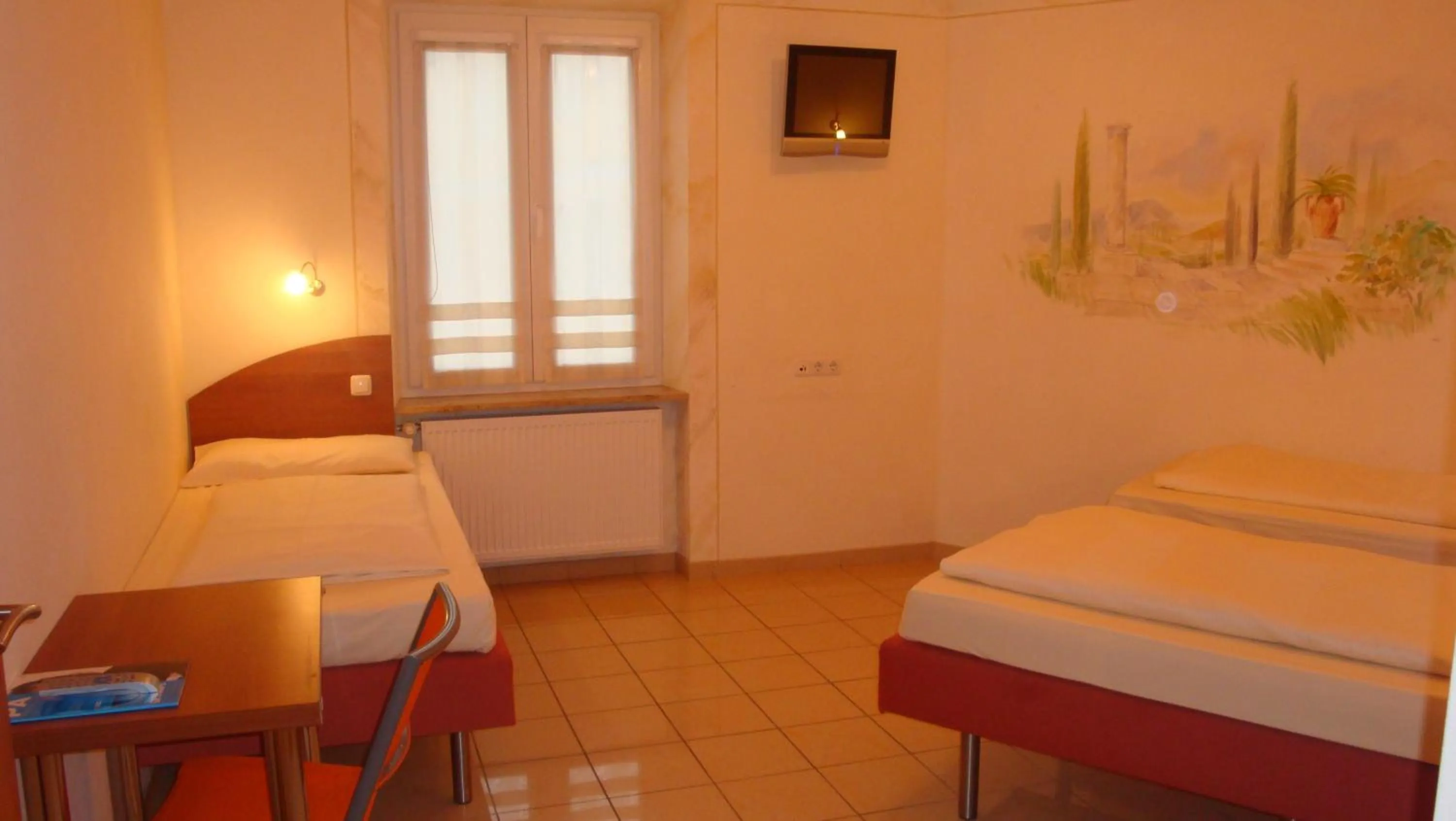 Photo of the whole room, Bed in StadtHotel Passau