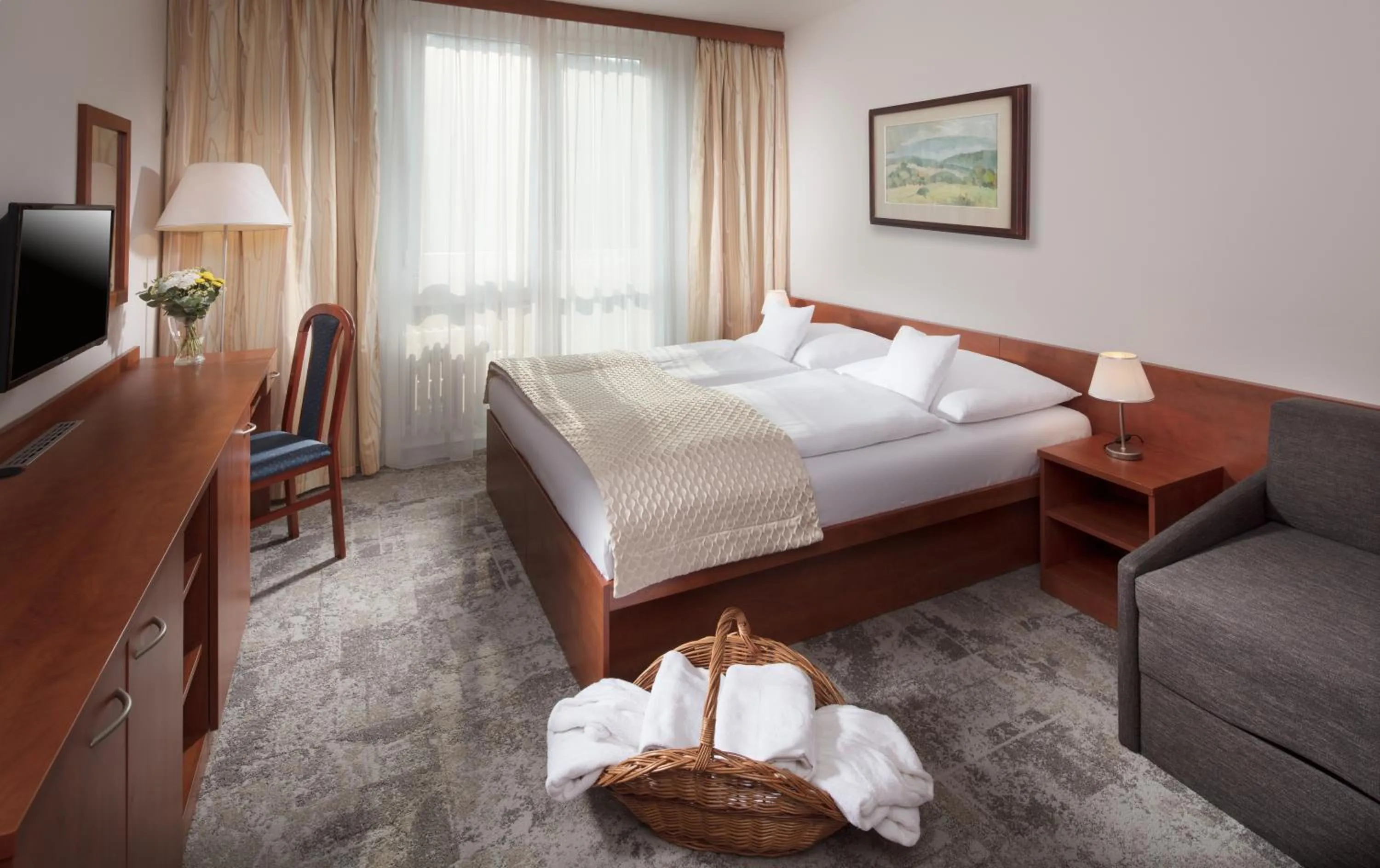 Bed in Pinia Hotel & Resort