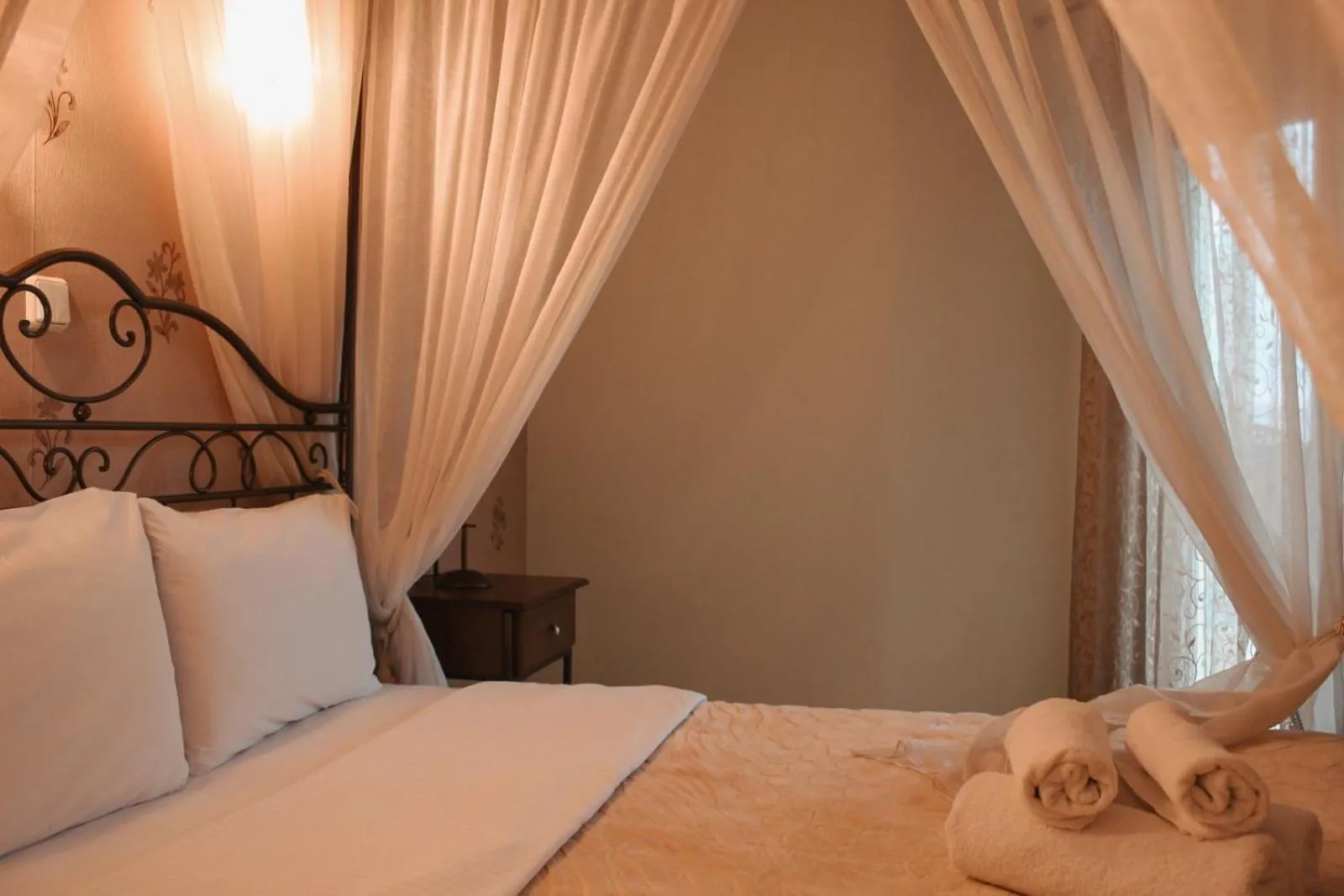 Bed in Enastron Hotel