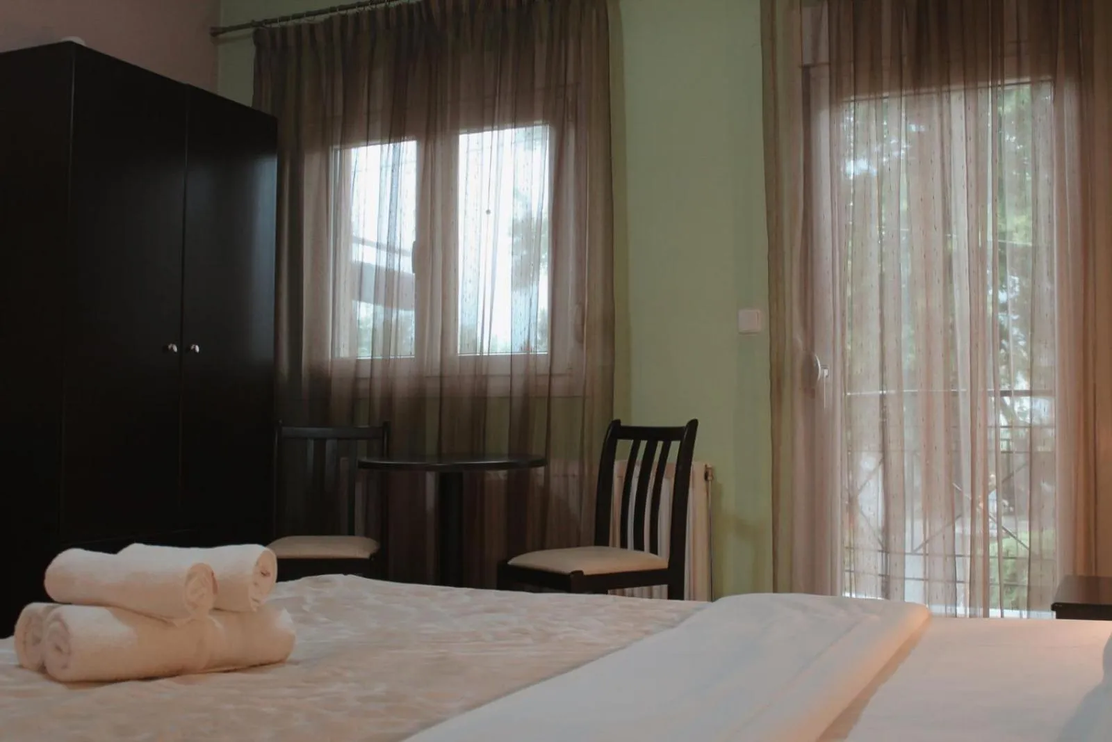 Bed in Enastron Hotel