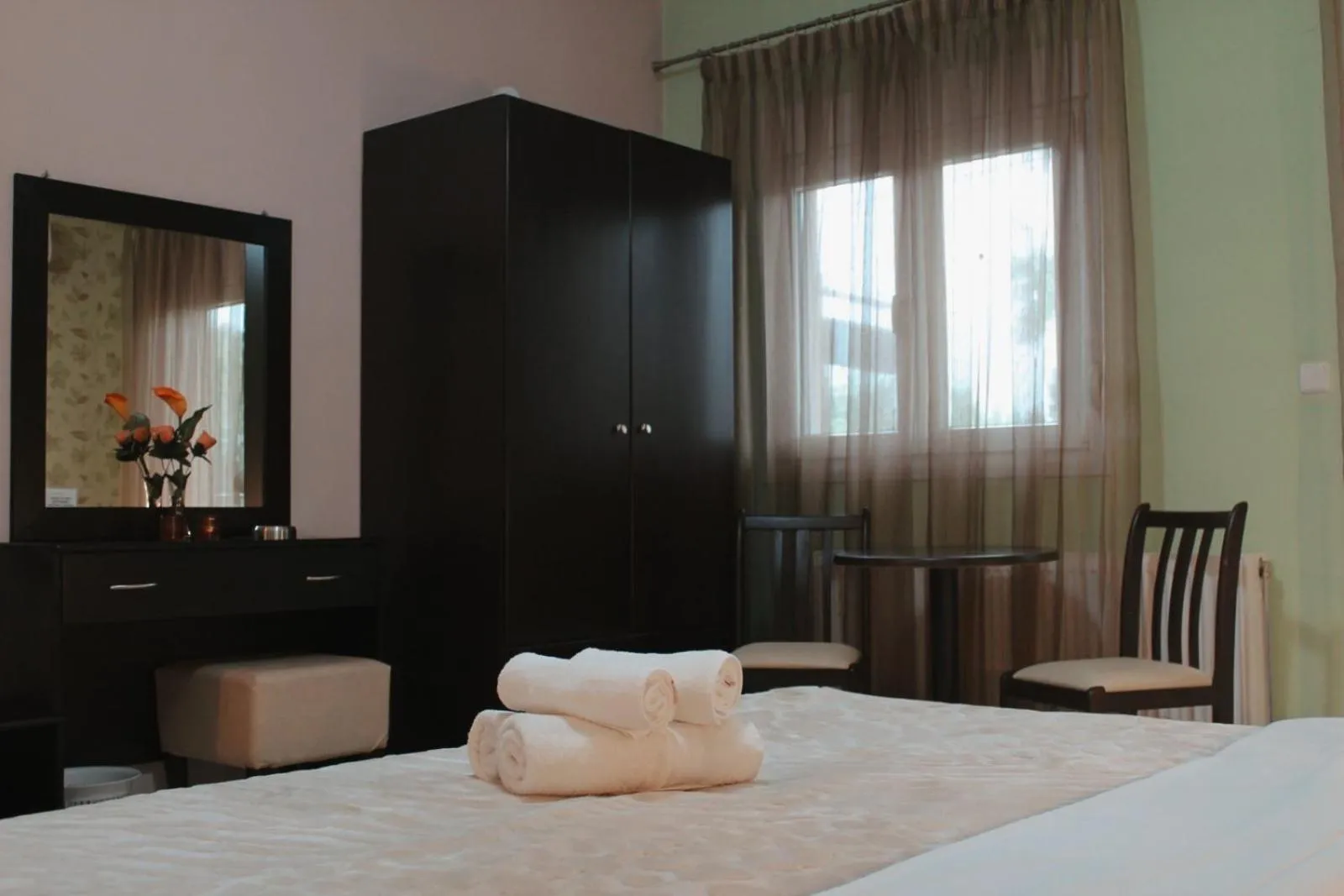 Bed in Enastron Hotel