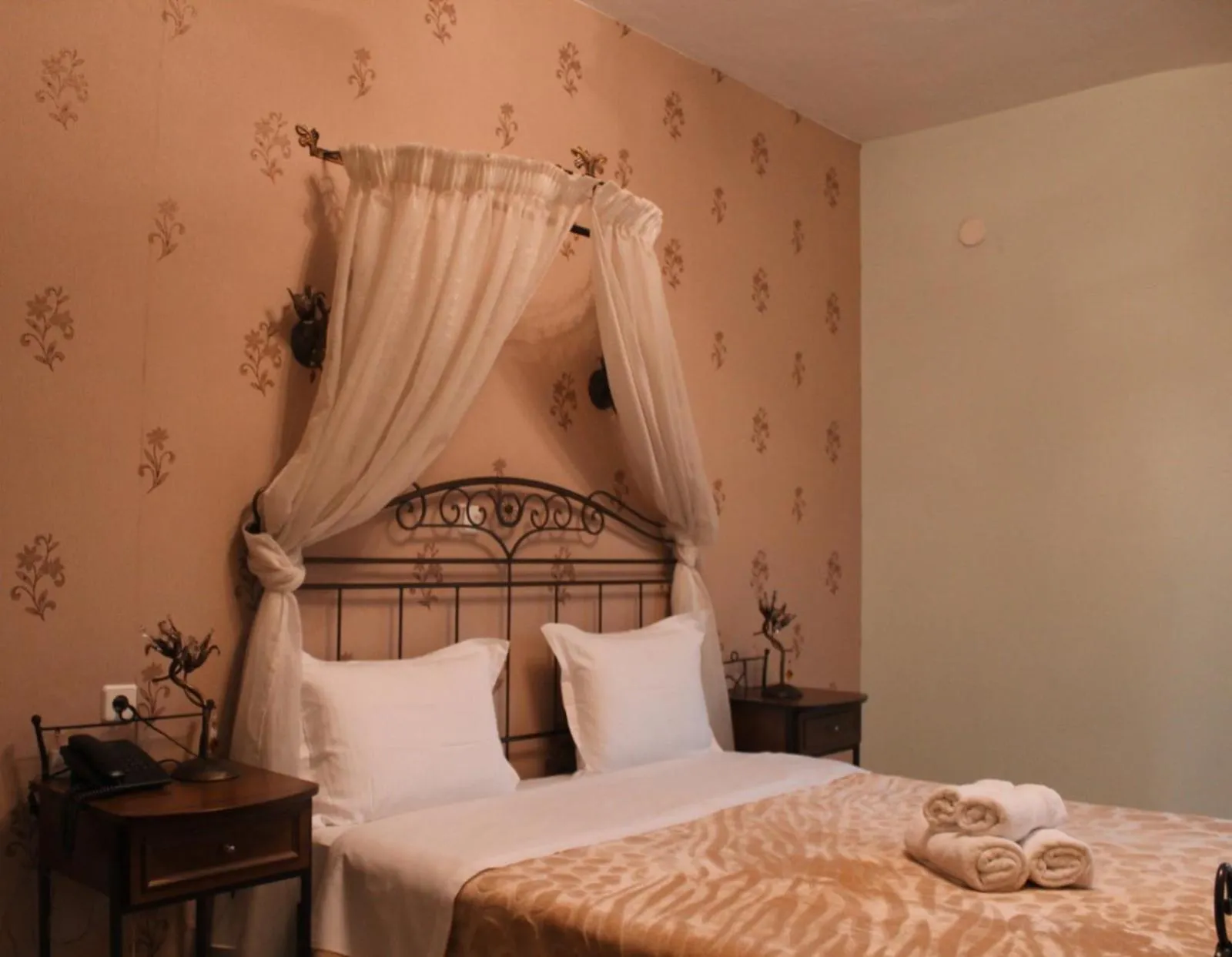 Bed in Enastron Hotel