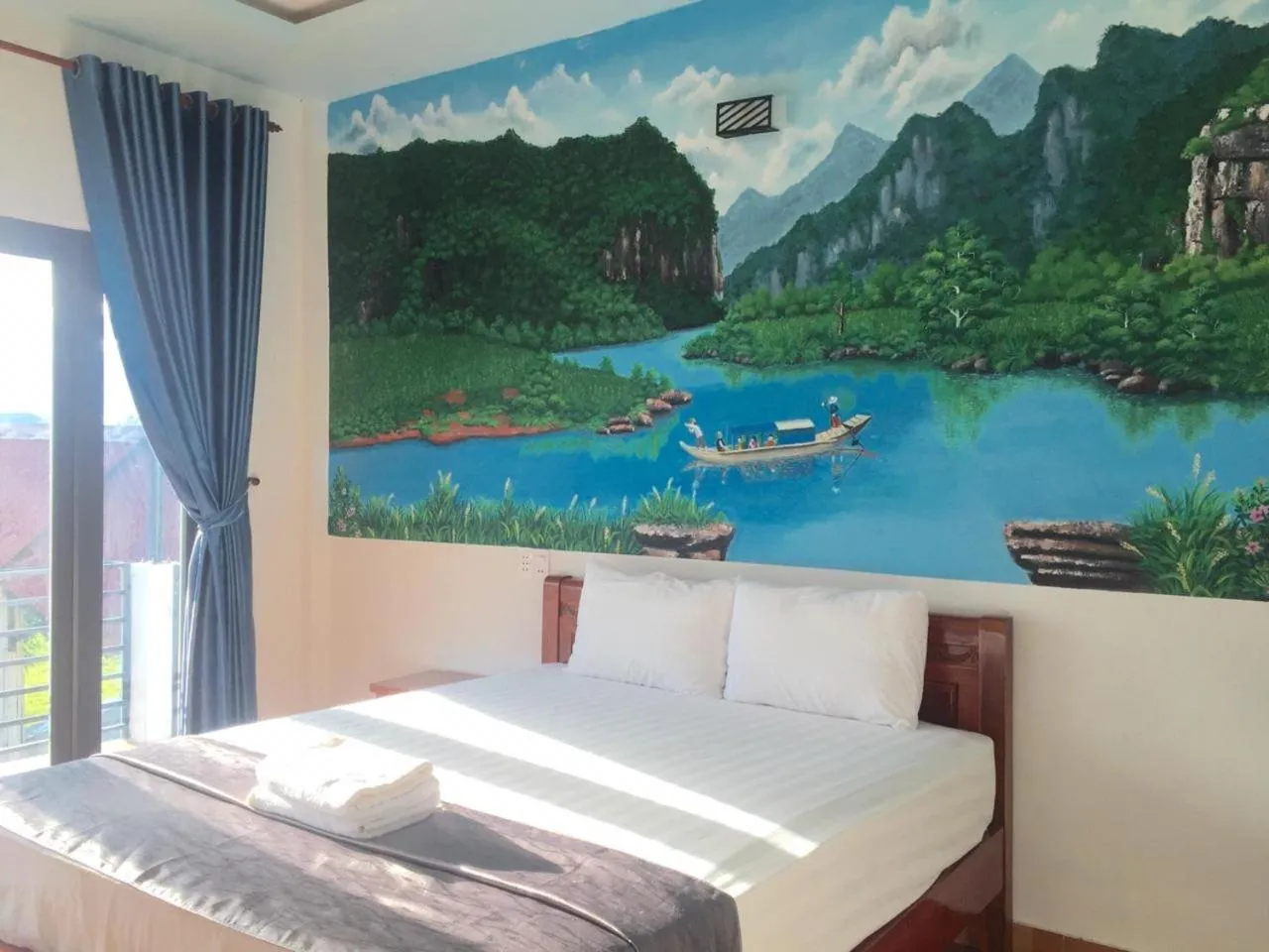 Bed in Palafita Bungalow