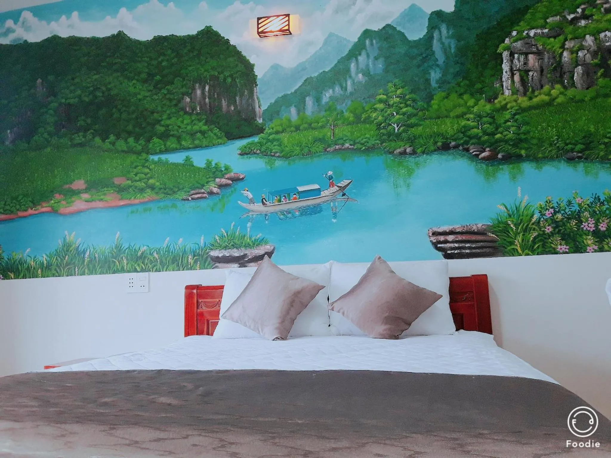 Bed in Palafita Bungalow