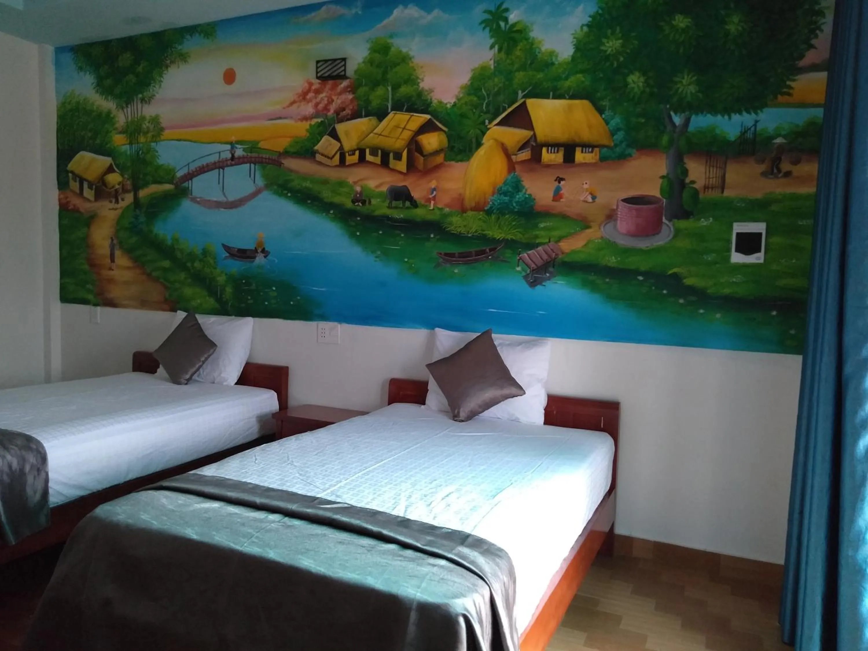 Bed in Palafita Bungalow