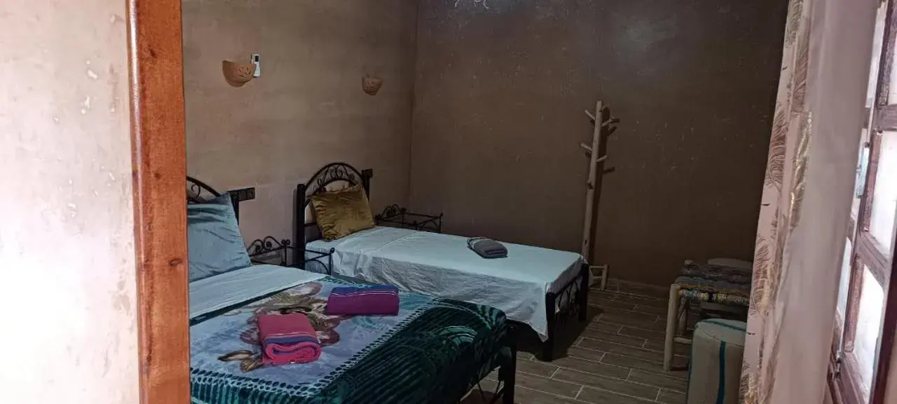 Triple Room with Private Bathroom in Auberge Restaurant TISSILI " Oasis de Fint" Triple Room with Private Bathroom in Auberge Restaurant TISSILI " Oasis de Fint"