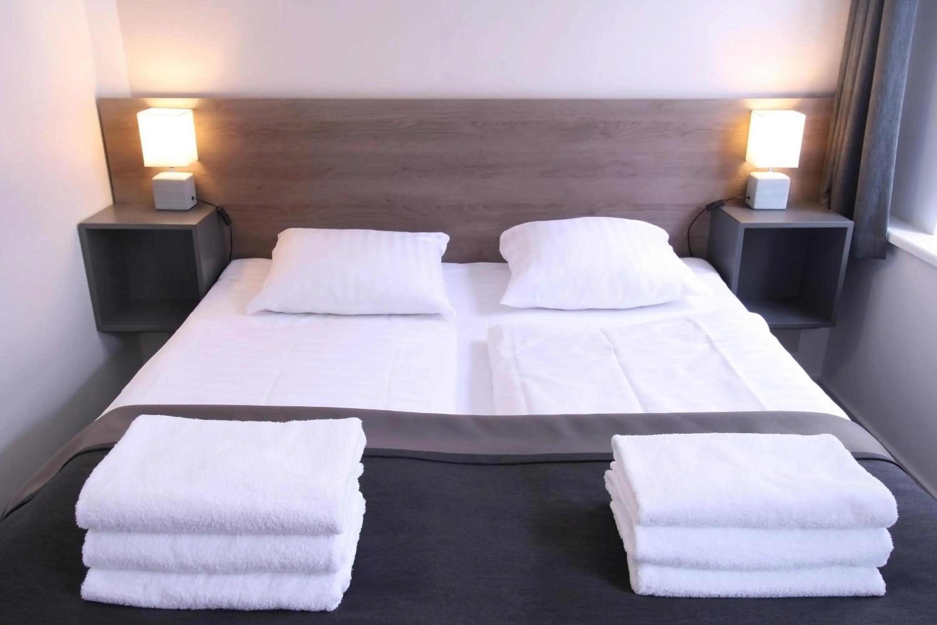 Bed in Hotel Aarhus City Apartments