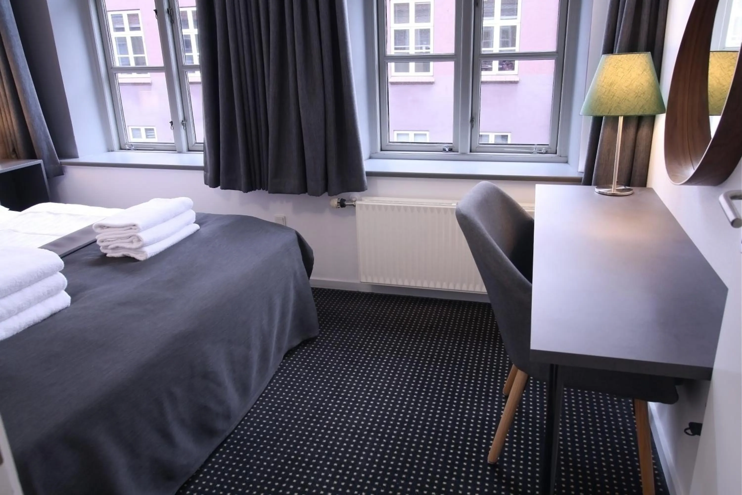 Bed in Hotel Aarhus City Apartments