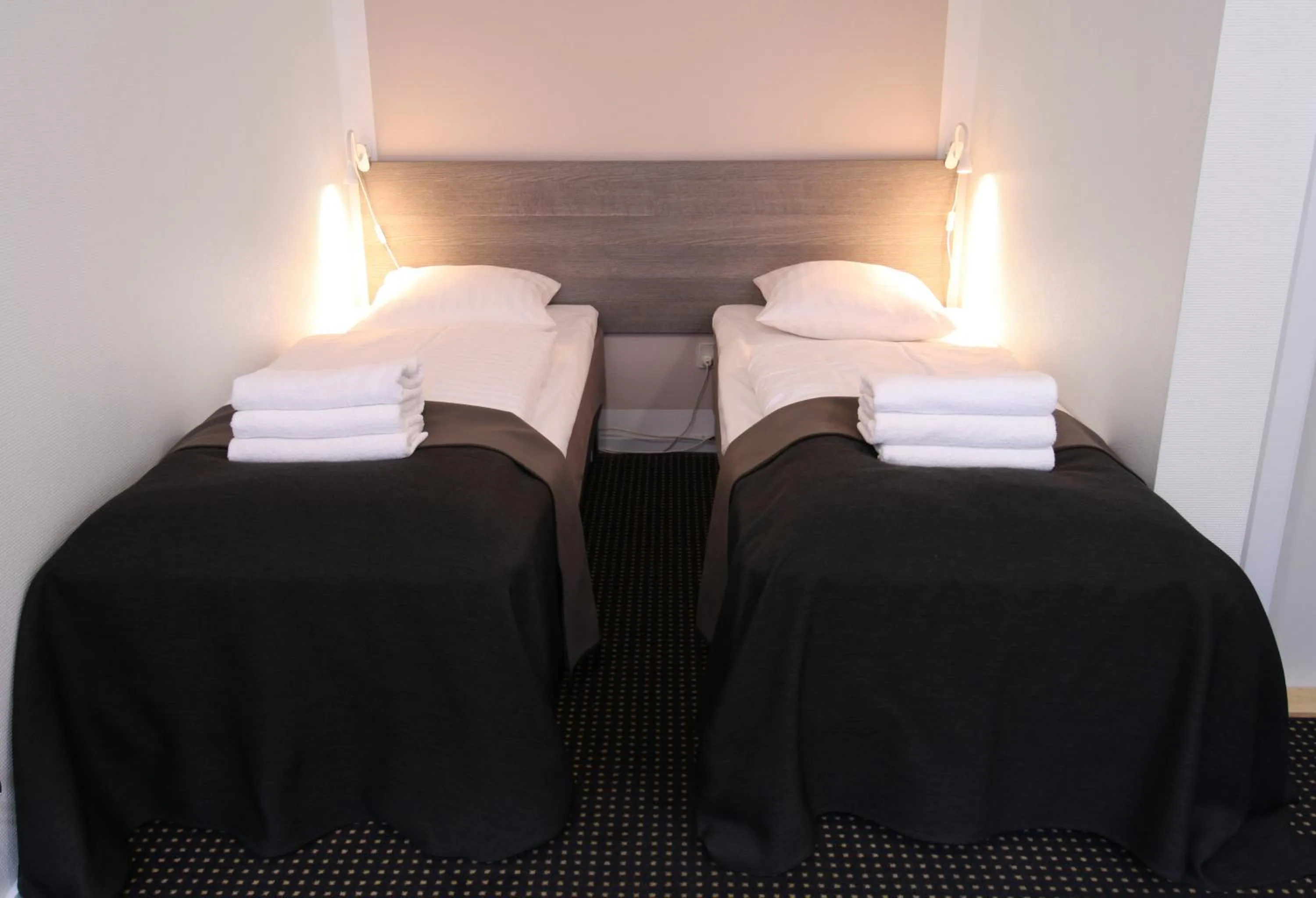 Bed in Hotel Aarhus City Apartments