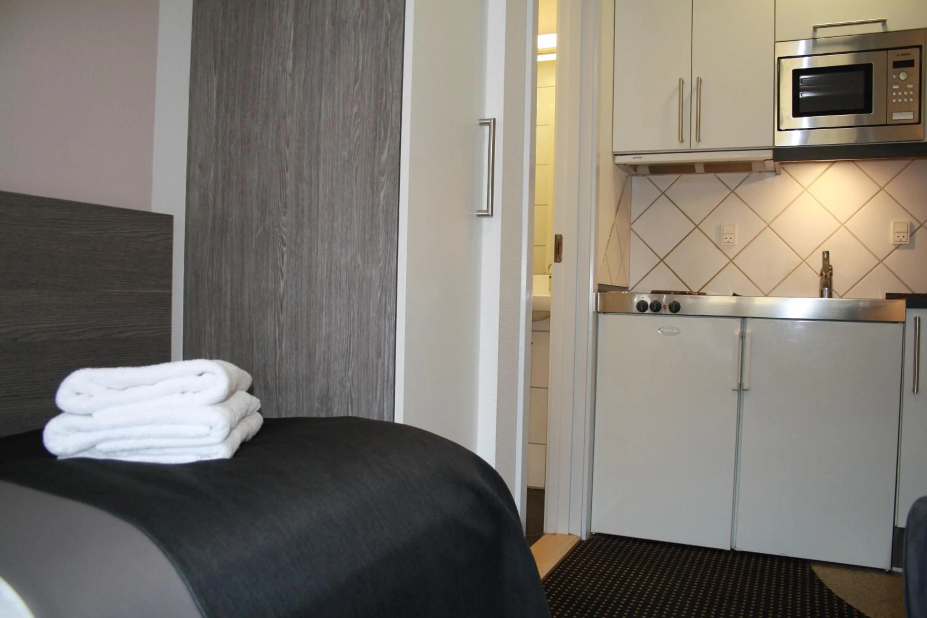 Kitchen or kitchenette in Hotel Aarhus City Apartments