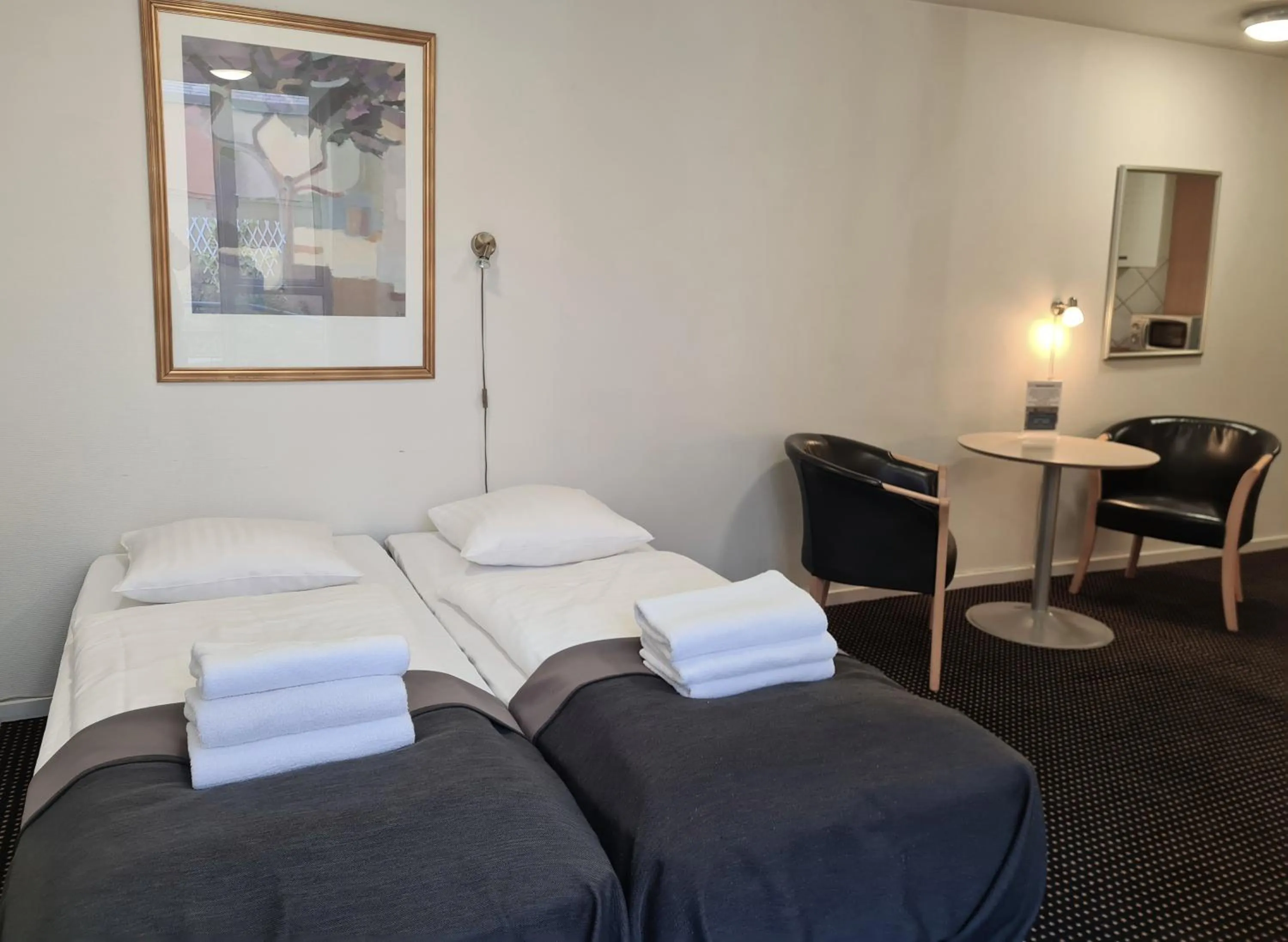 Bed in Hotel Aarhus City Apartments