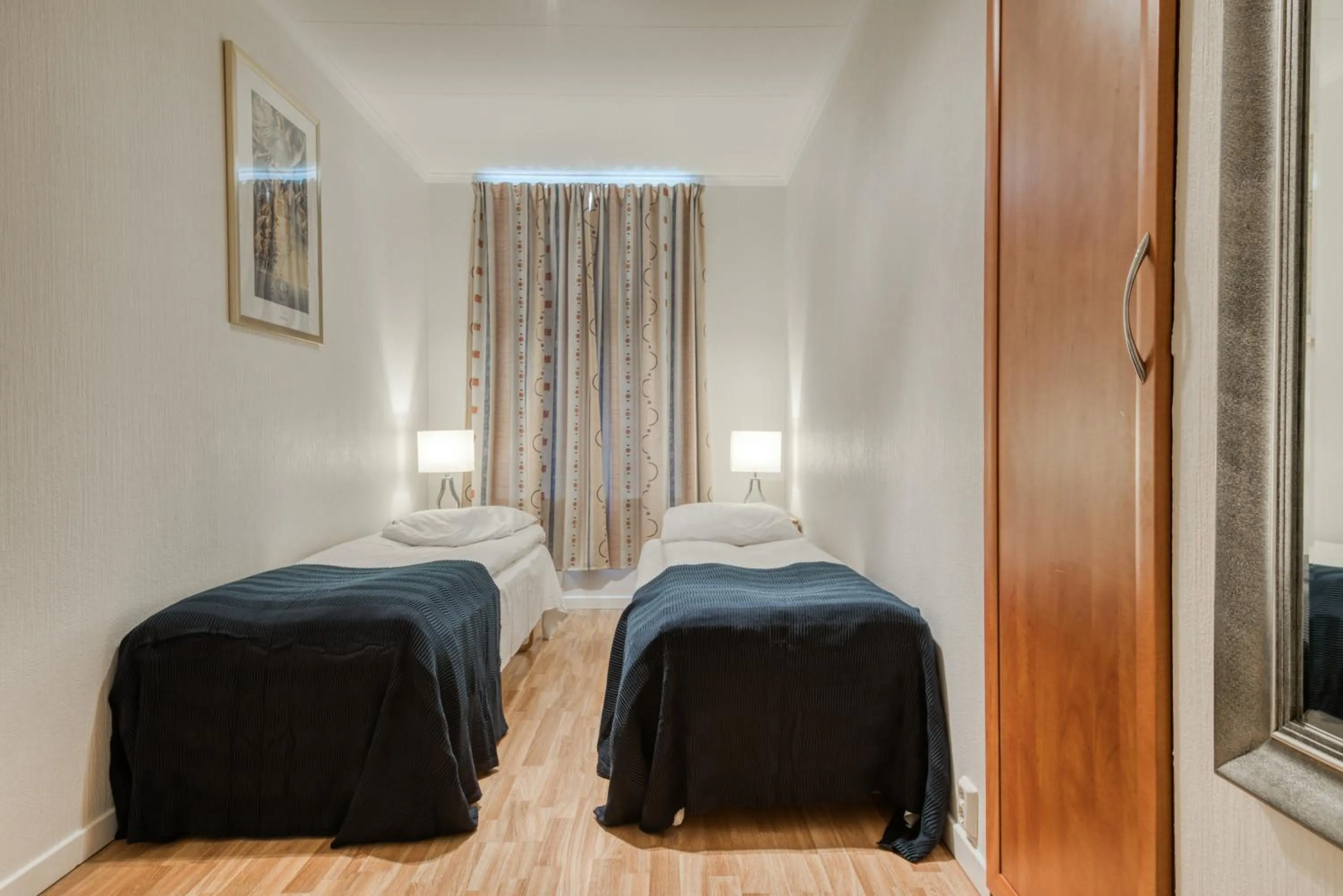 Bedroom, Bed in Trondheim Leilighetshotel