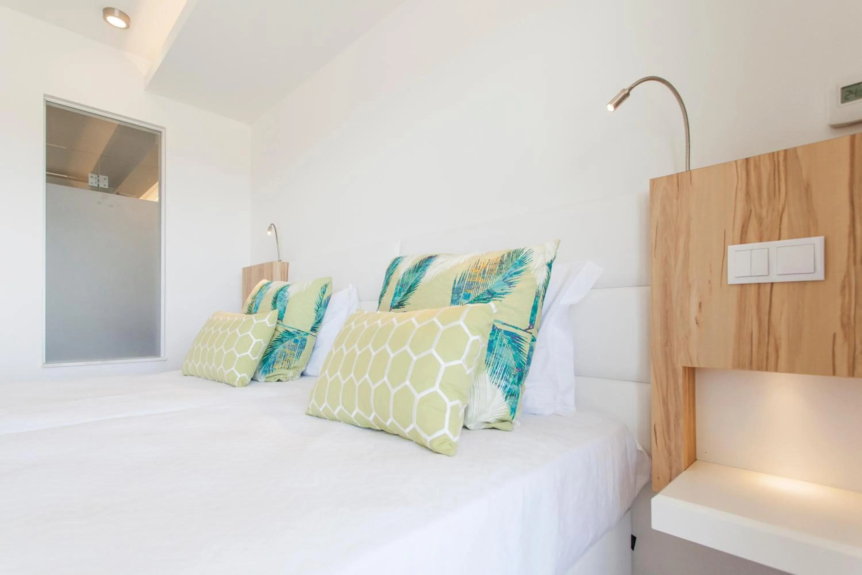 Bed in Alfagar Aparthotel