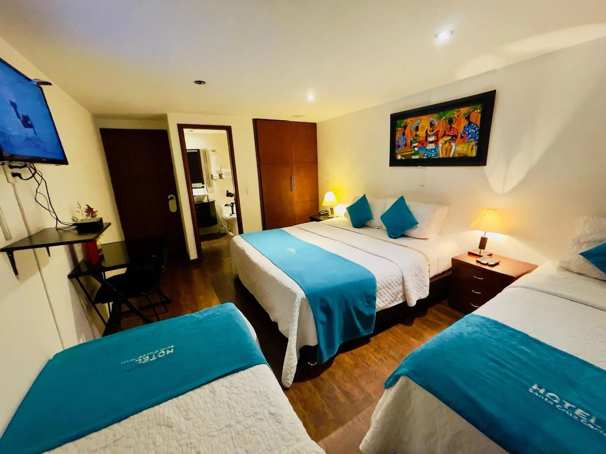 Quadruple Room in Hotel Santa Cruz Bogotá Quadruple Room in Hotel Santa Cruz Bogotá